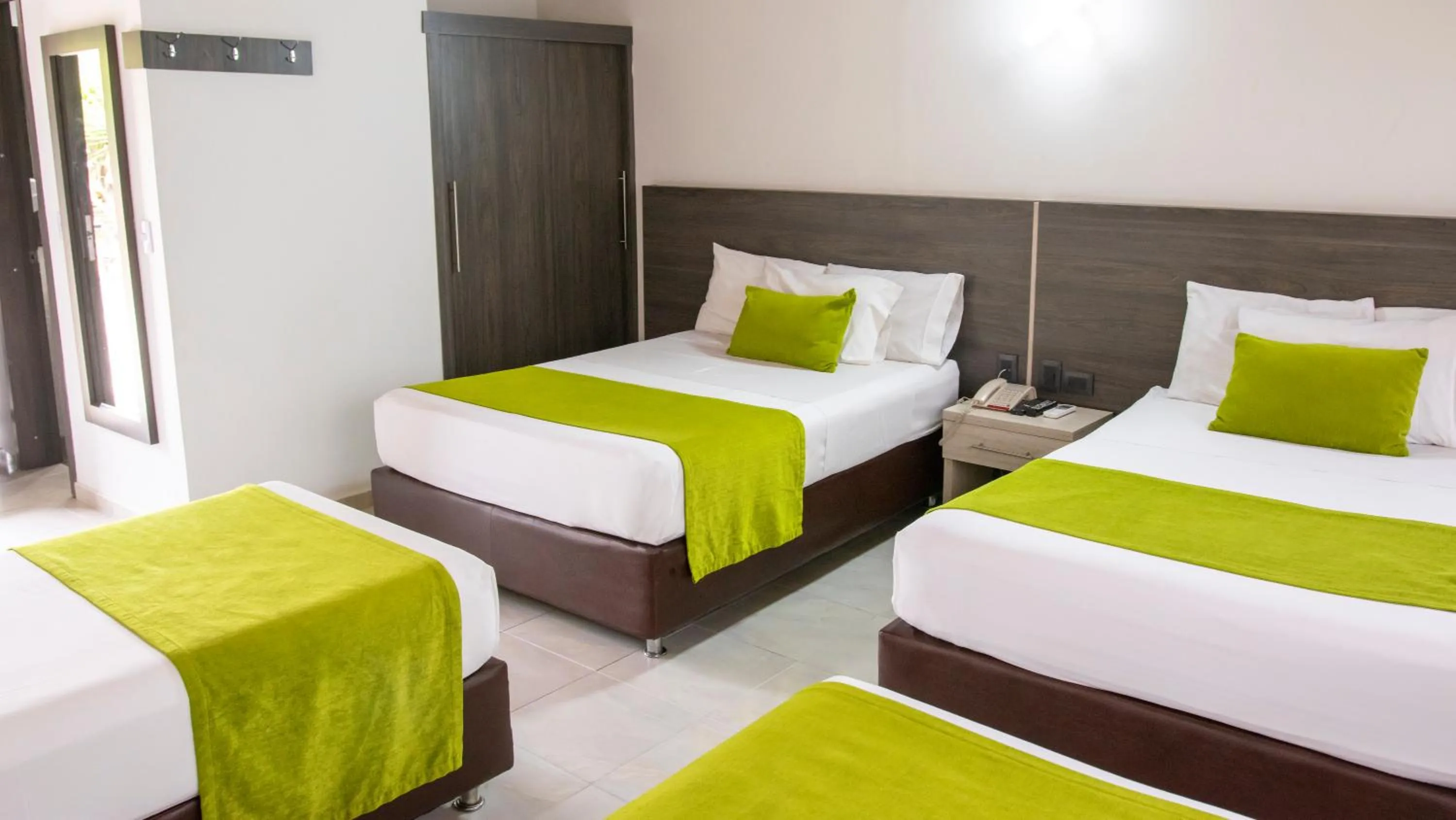 Bed in Hotel San Juan Internacional