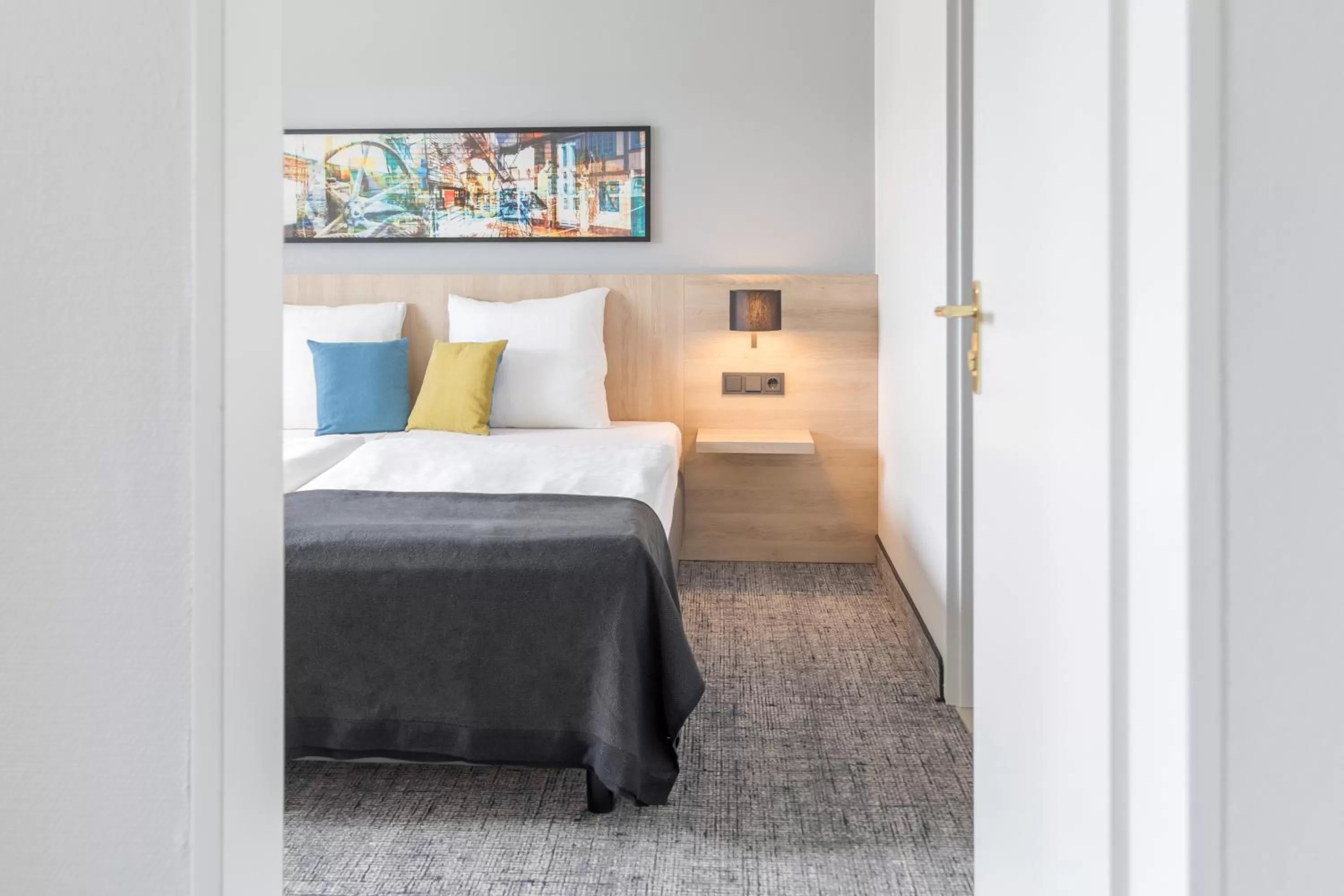 Photo of the whole room, Bed in Ramada by Wyndham Flensburg City