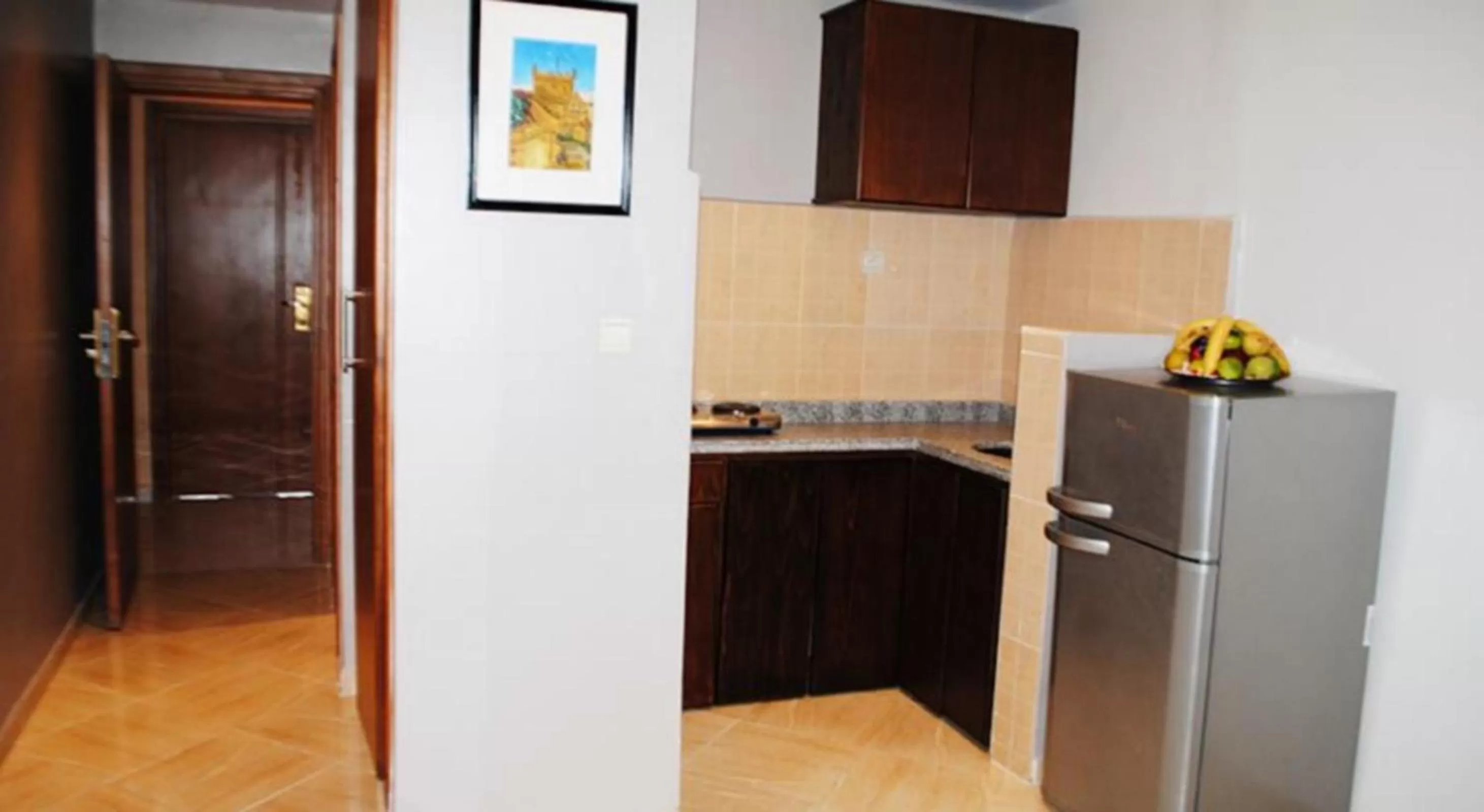 Kitchen or kitchenette in Résidence Hotelière Fleurie