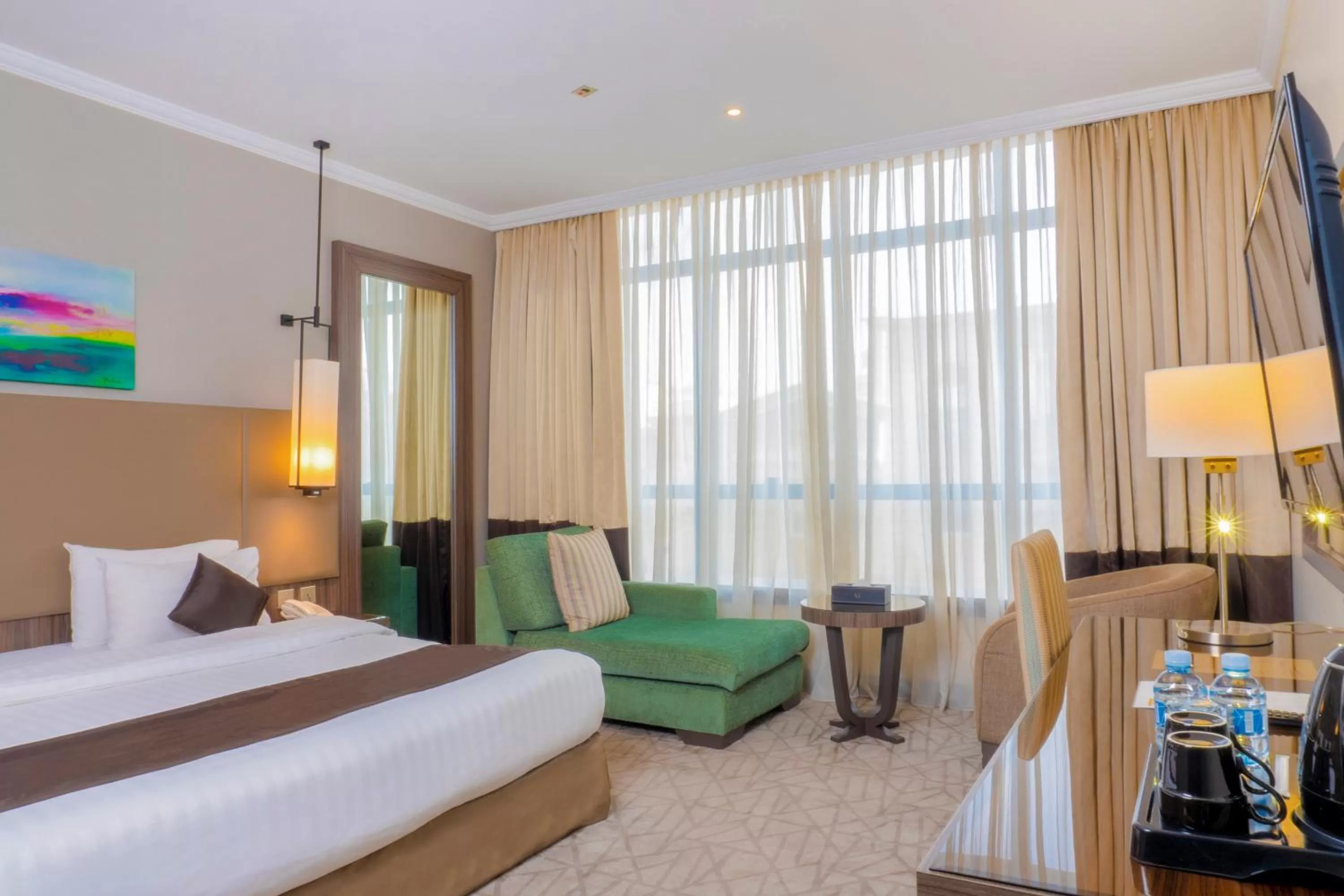 Photo of the whole room in Aquila Al Hamra Hotel