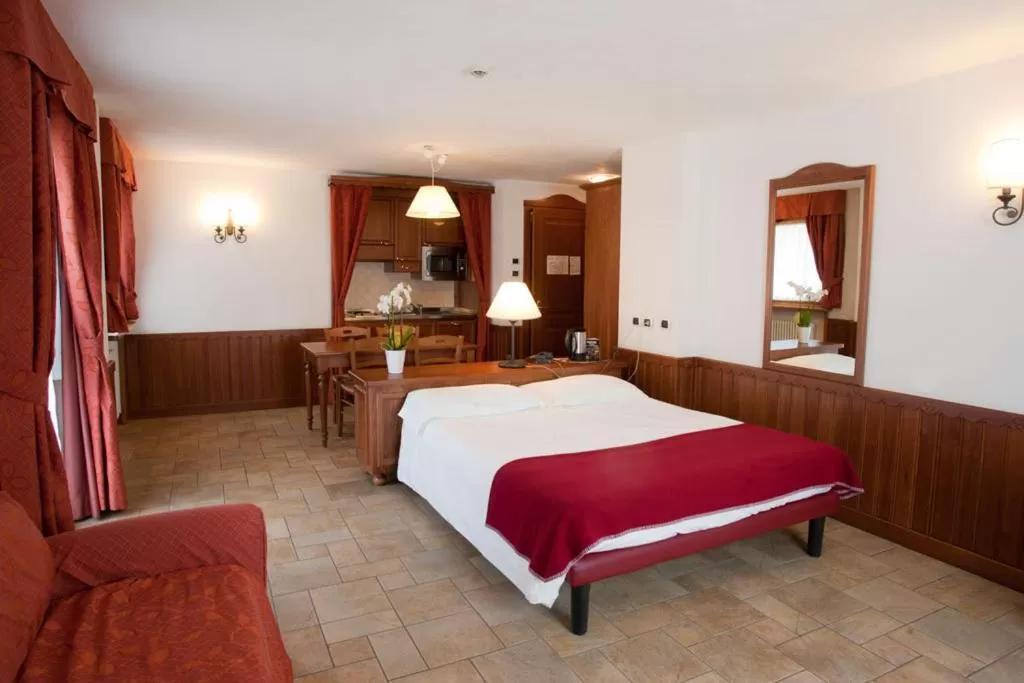 Kitchen or kitchenette, Bed in Residence Le Grand Chalet