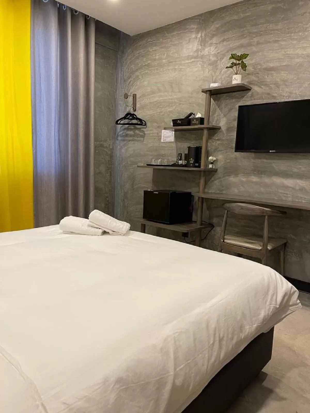 Bed in Sri Indar Hotel & Suites