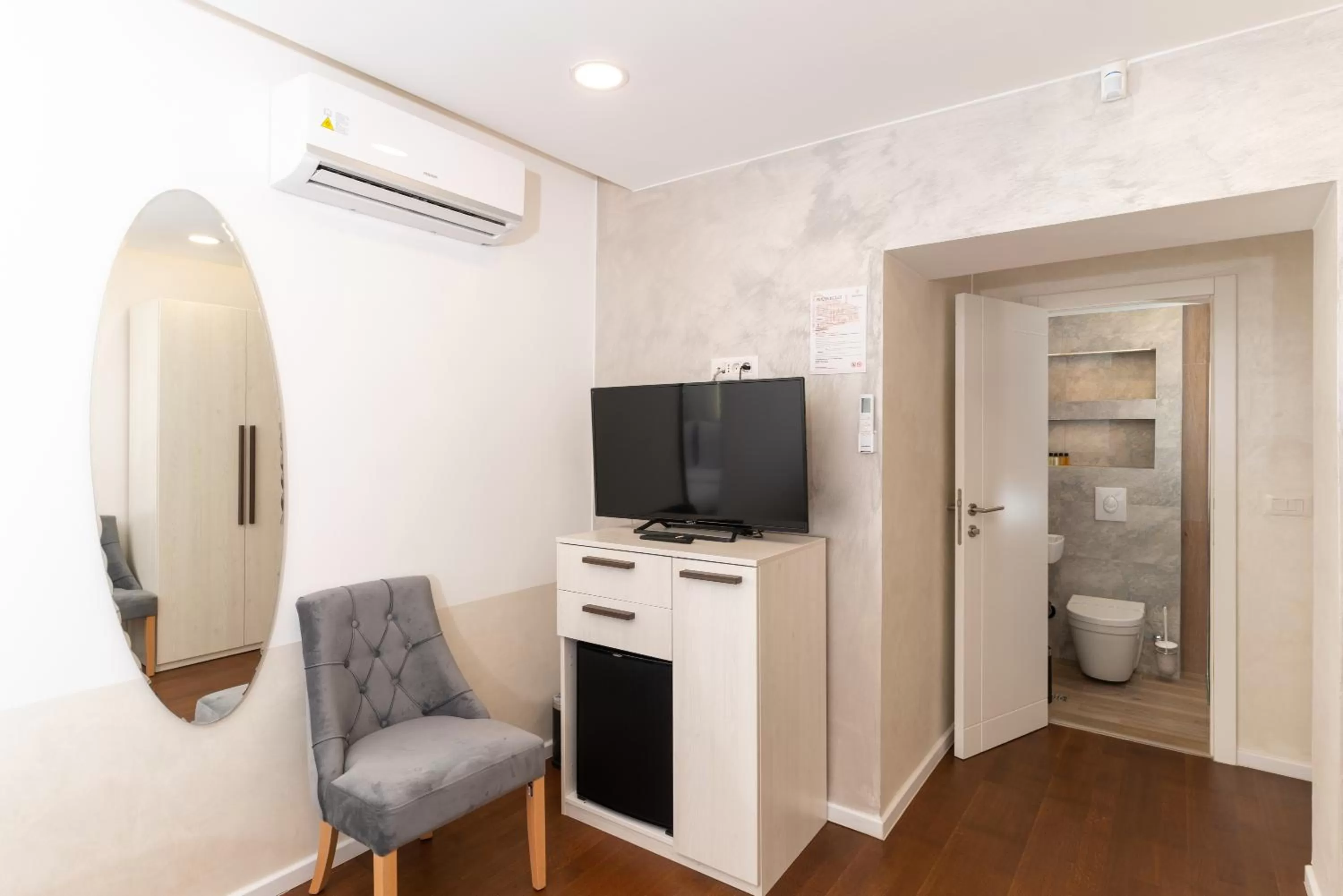 Bedroom in Ornament Hotel and Apartments