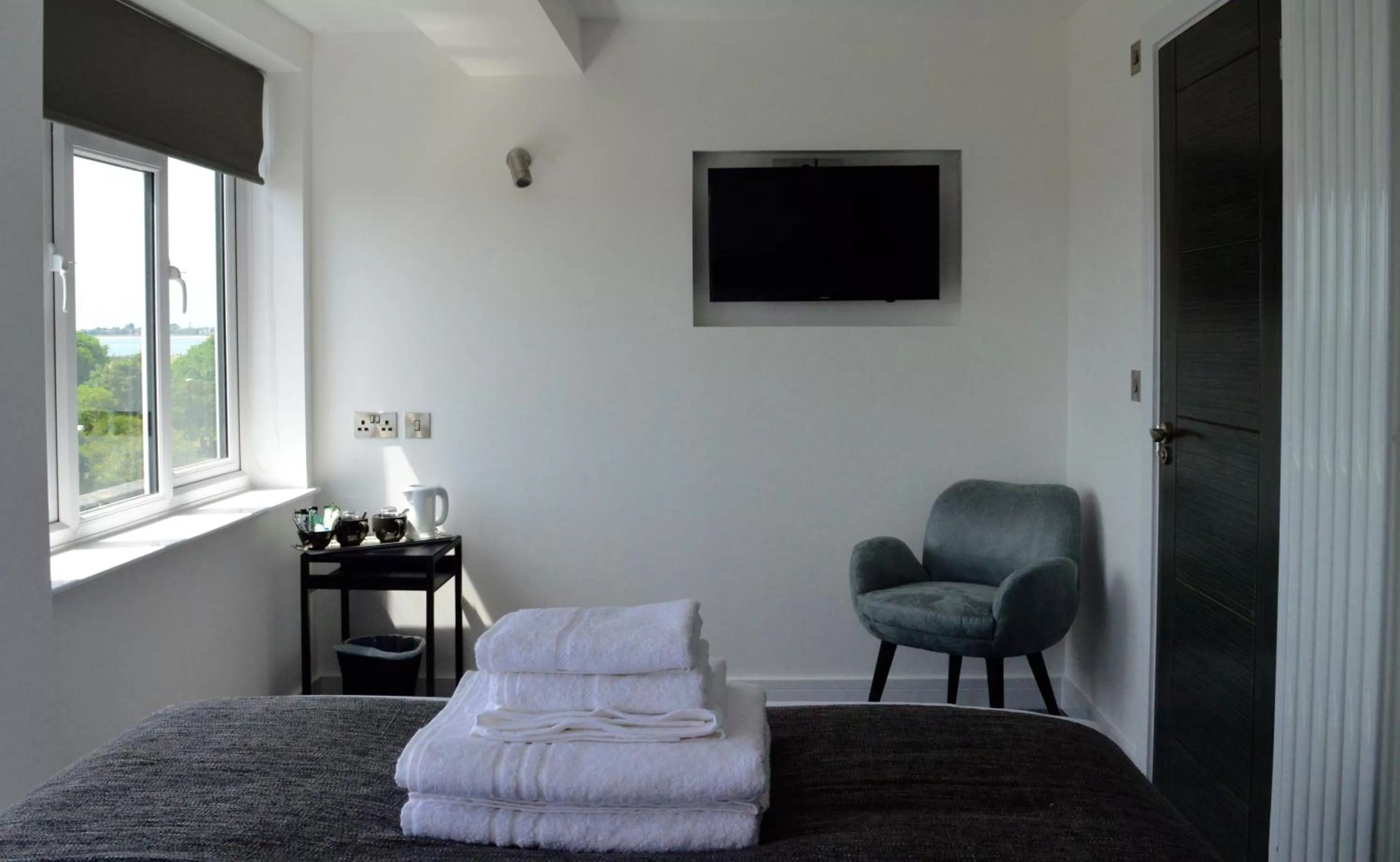 Bed in Q8 Boutique Hotel