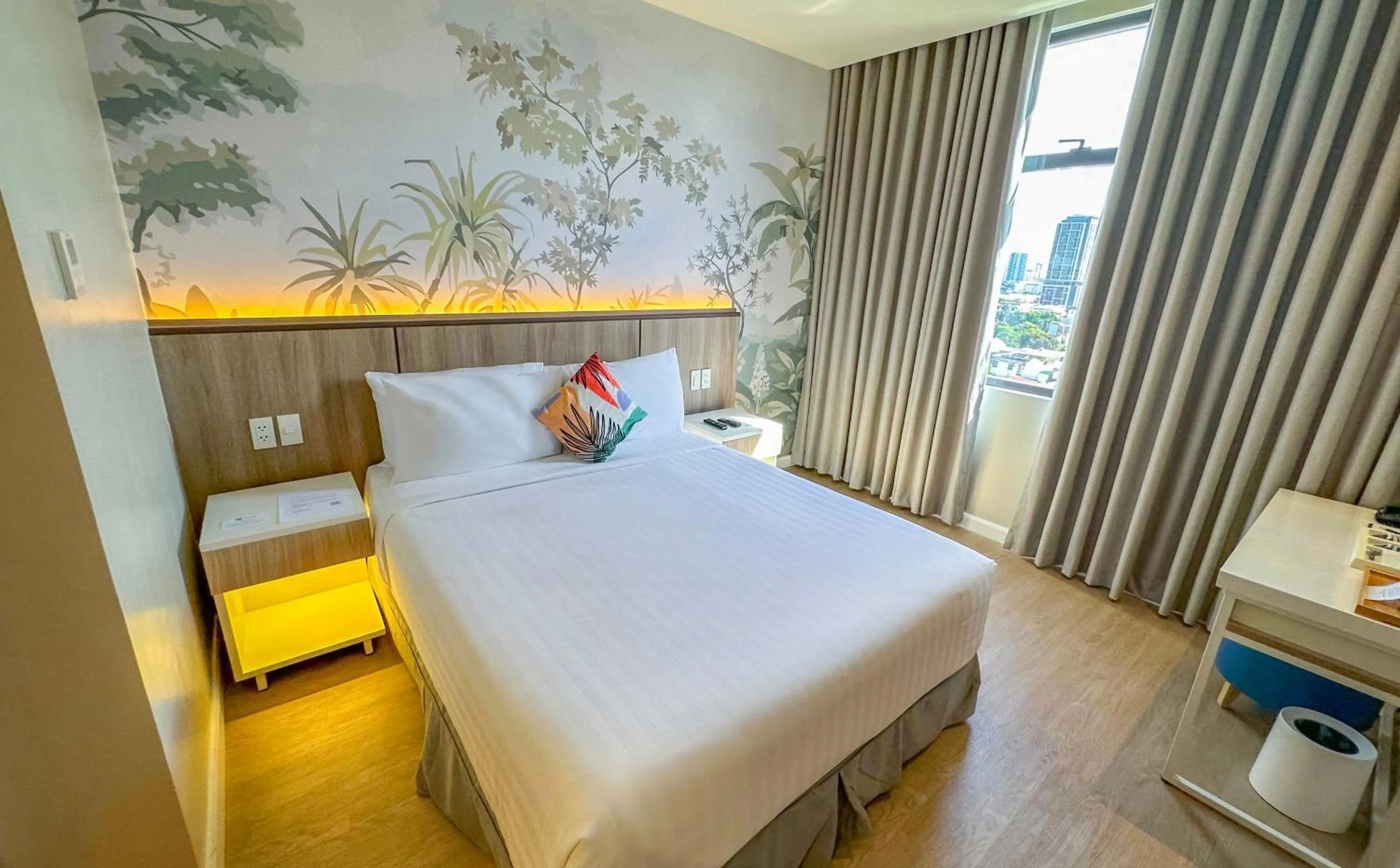 Bed in Harolds Hotel Quezon City