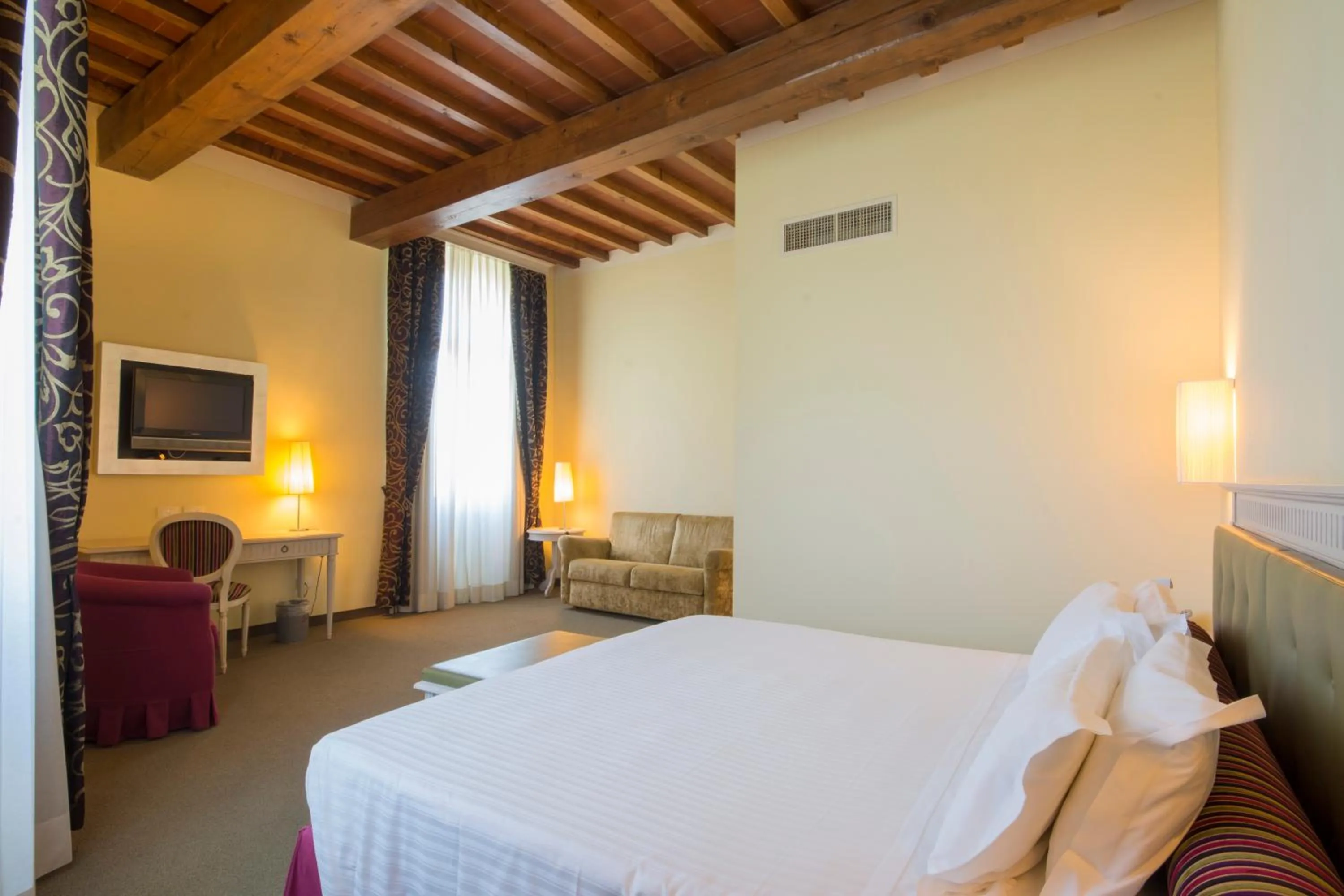 Bed in LHP Certaldo Resort