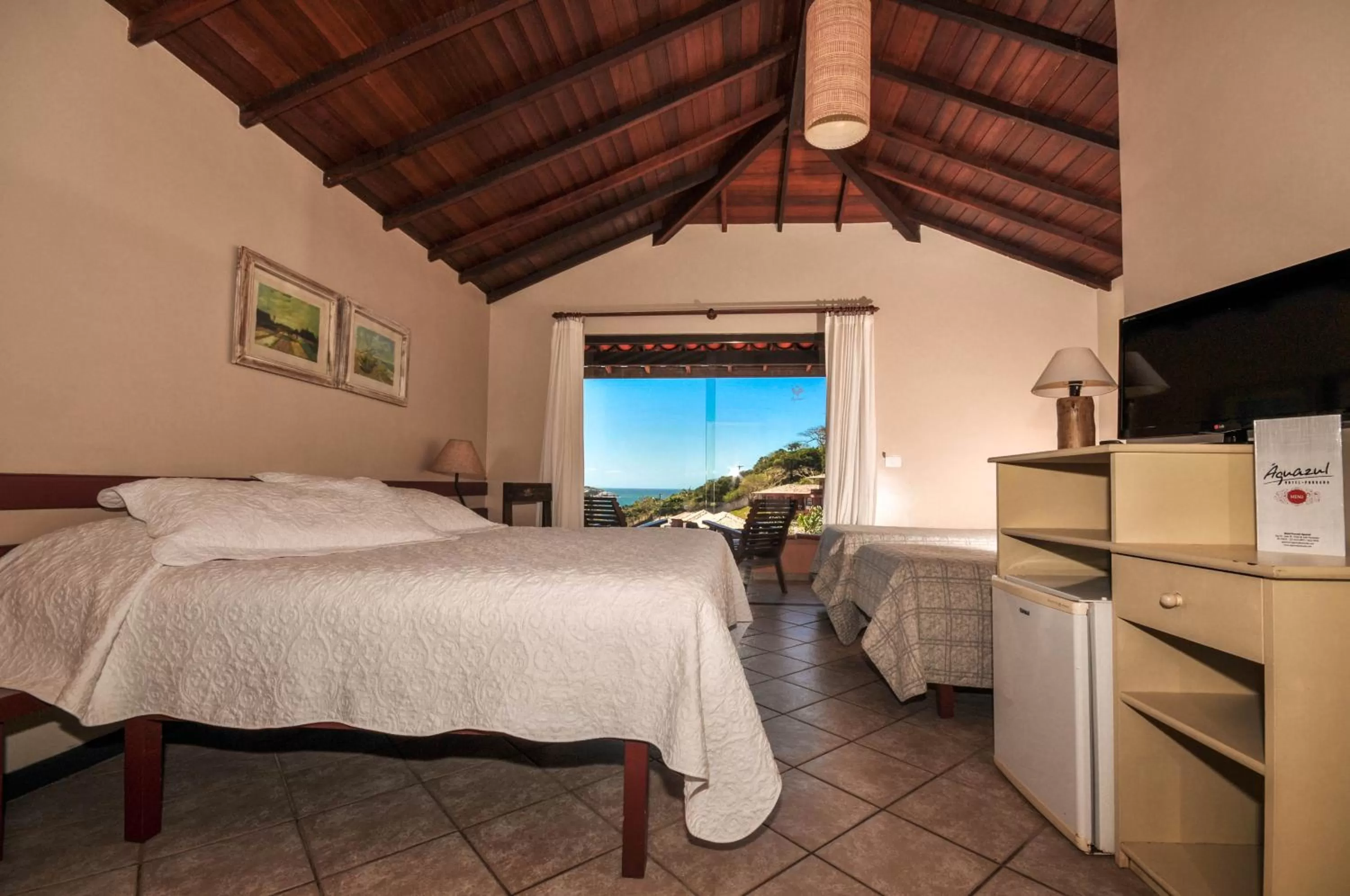 Bed in Aguabúzios Hotel