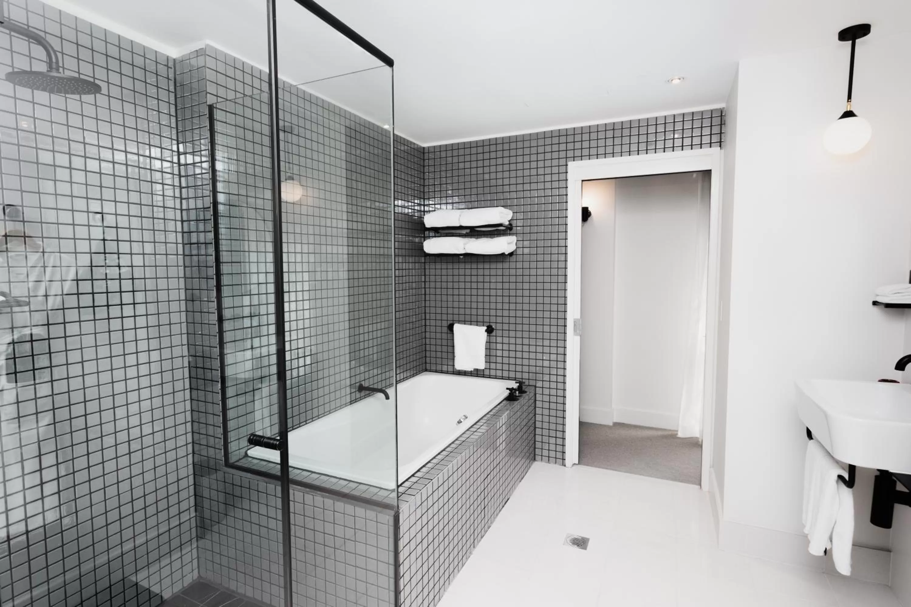 Bathroom in Ovolo Sydney Woolloomooloo, a Wyndham Hotel