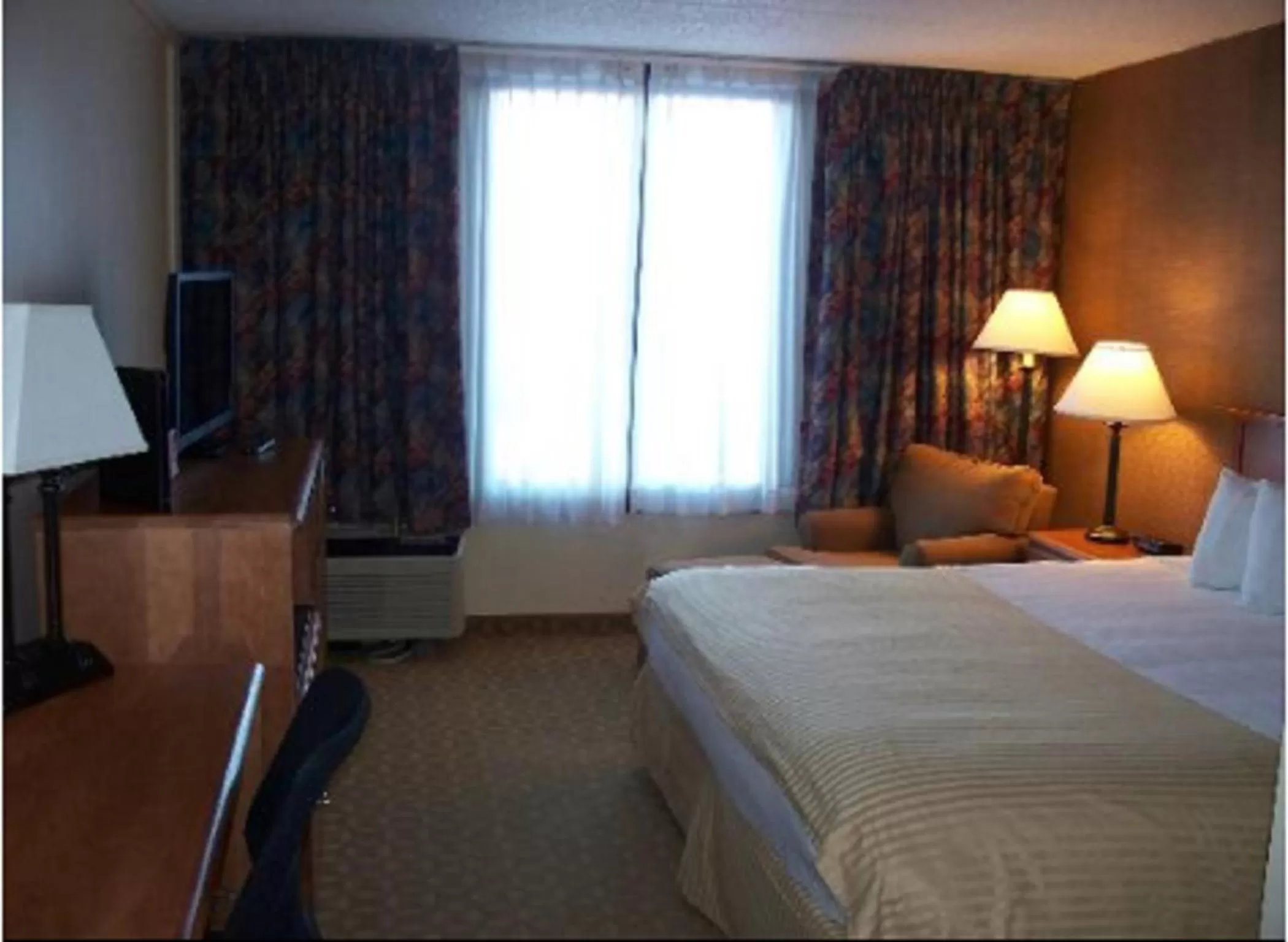 Day, Bed in Ramada by Wyndham Watertown Thousand