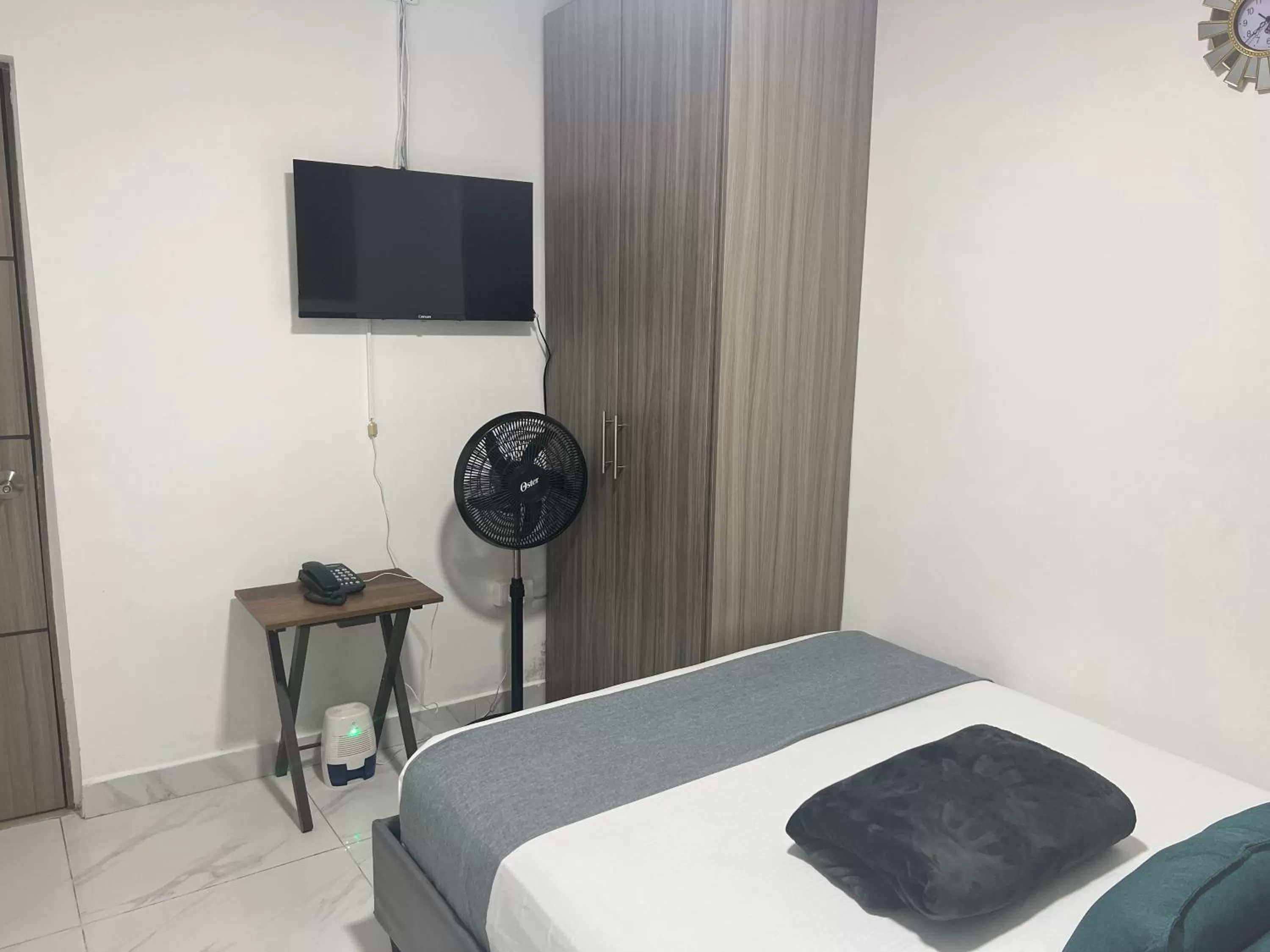 Photo of the whole room, TV/Entertainment Center in La Forêt de Café Hotel