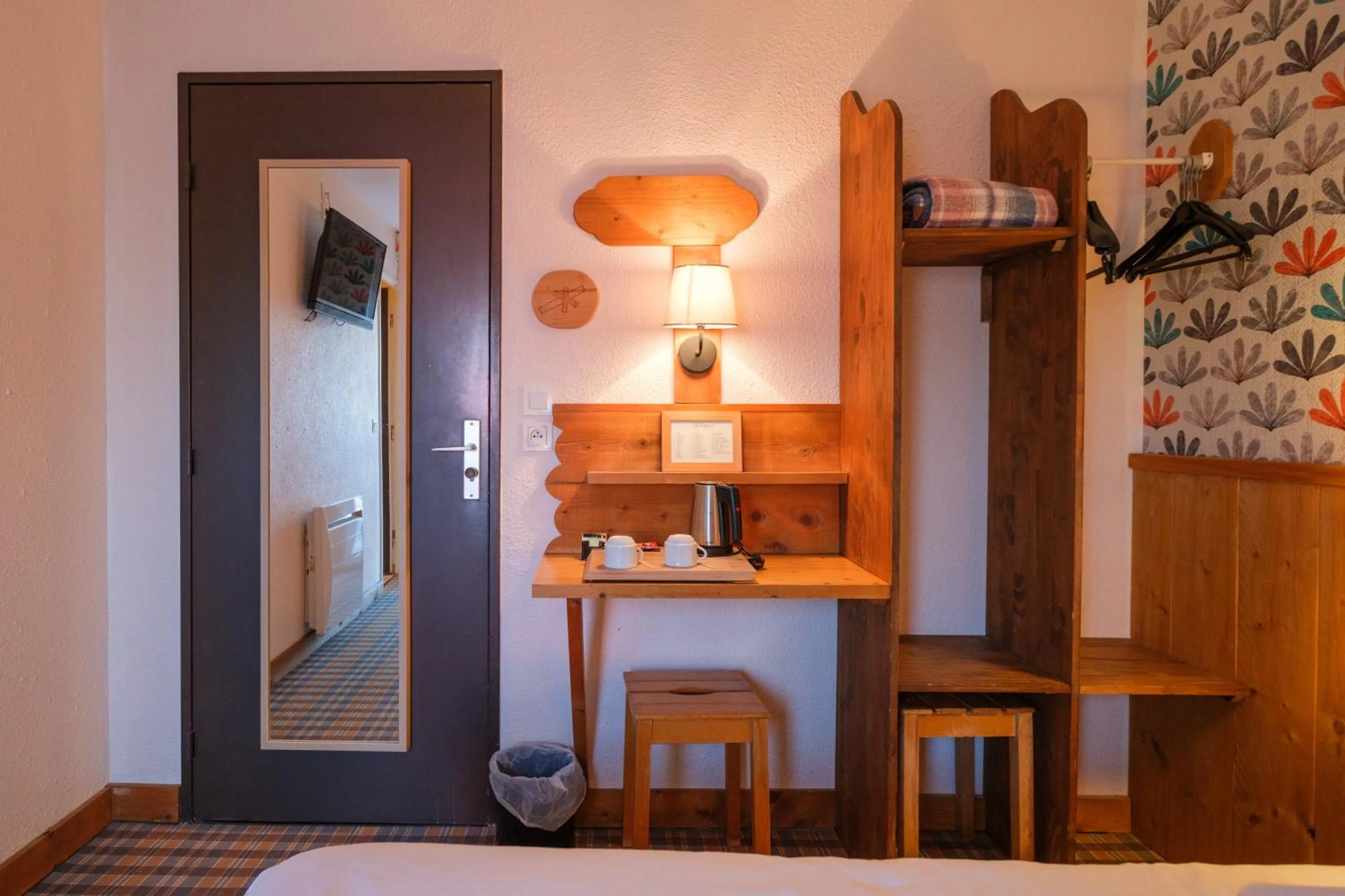 Bedroom in Cit'Hotel Le Montreal