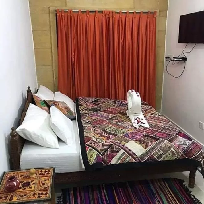 Bed in Hotel Murad Haveli