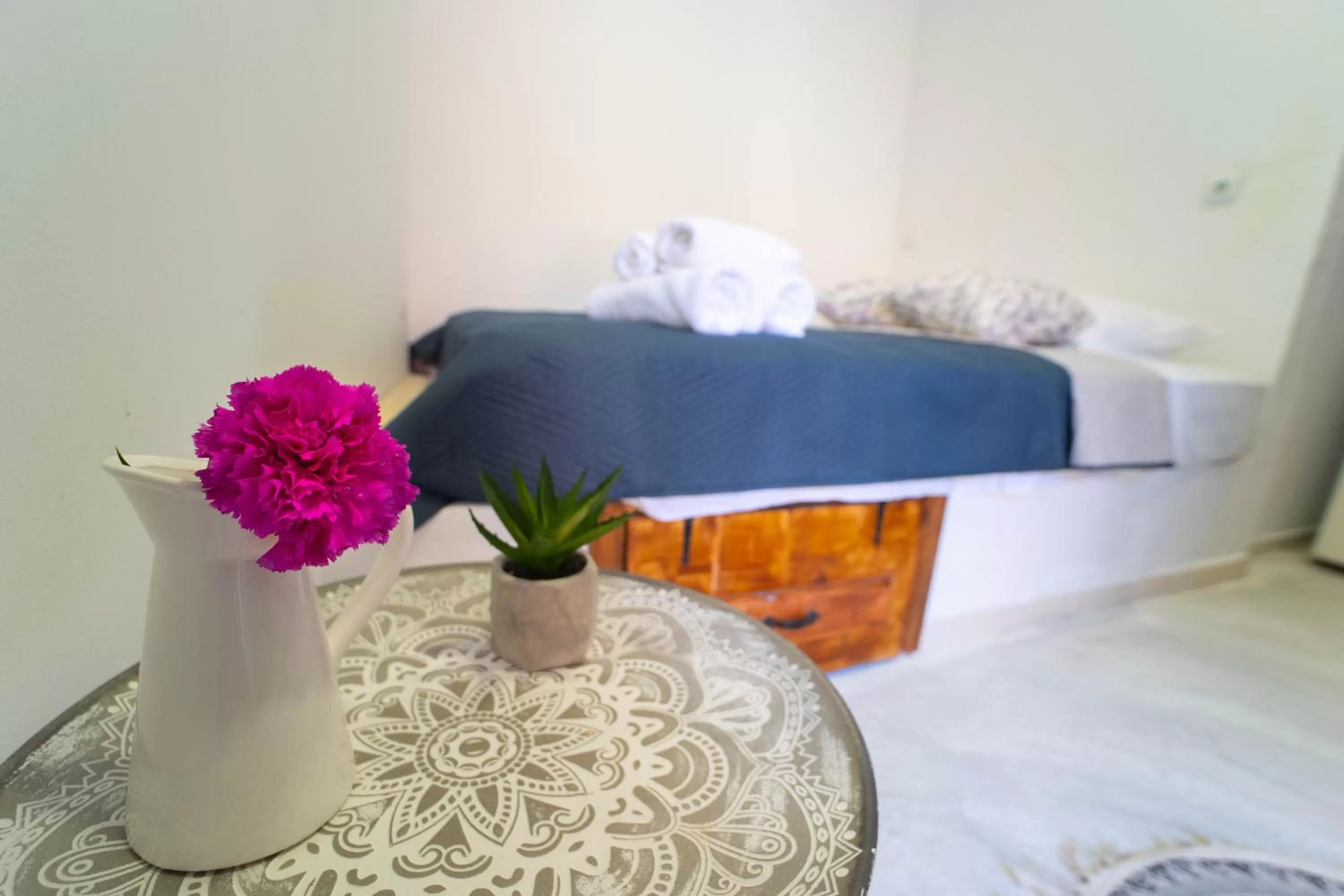 Bed in Mascot Garden Rooms