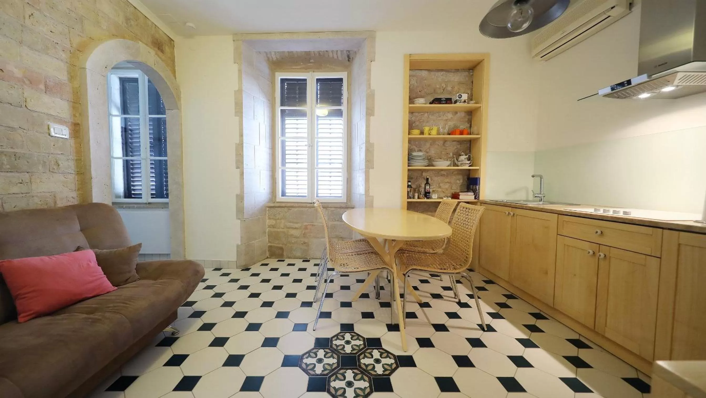 TV and multimedia in Central Apartments Integrated Hotel