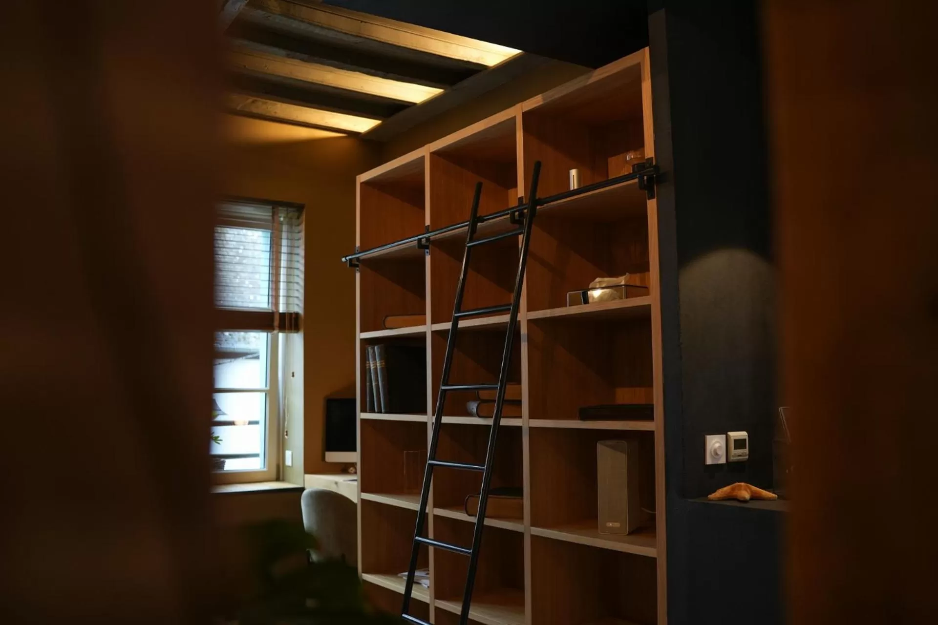 Library in Maison d'hôtes du Jardin