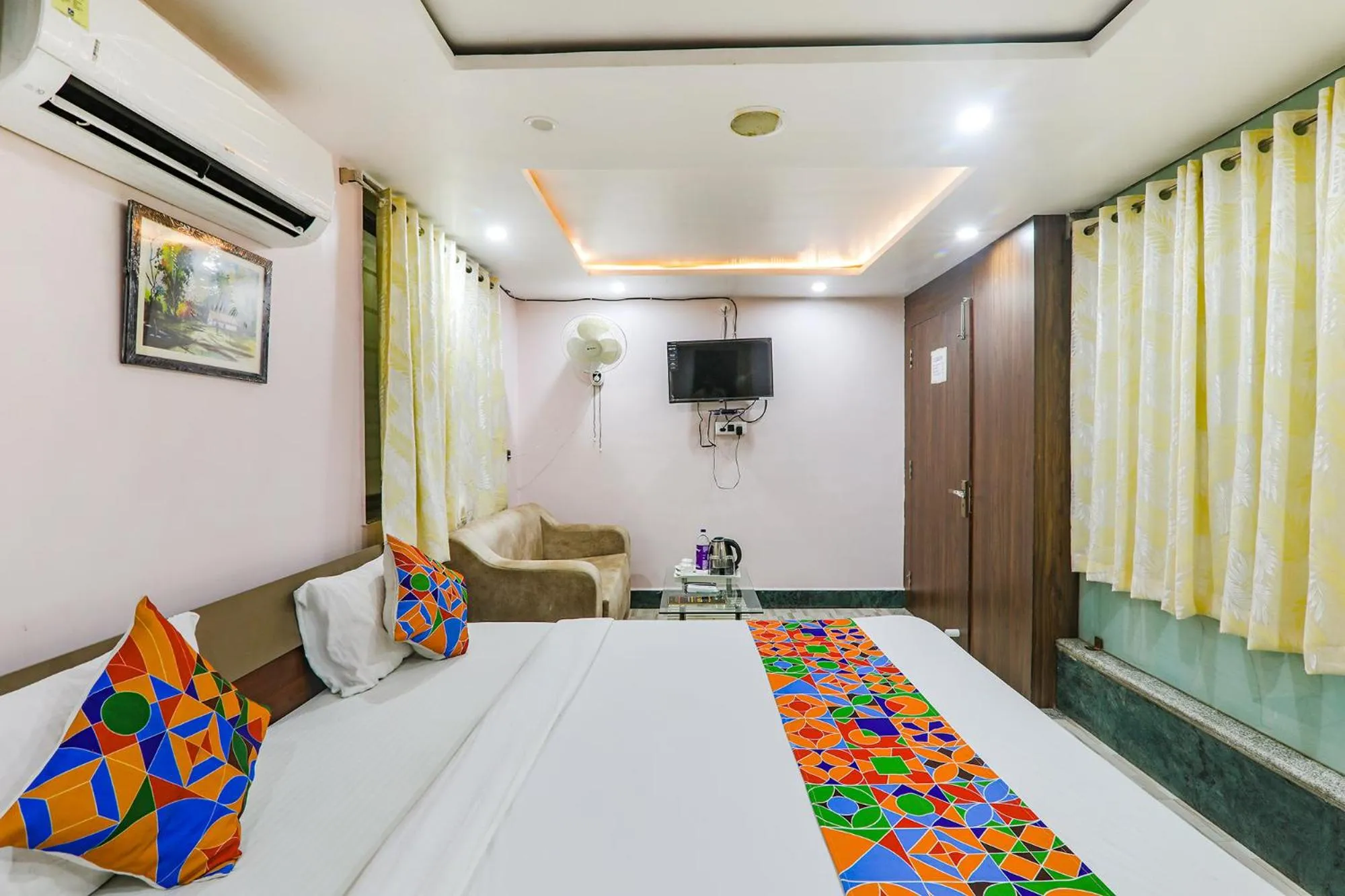 Bed in FabHotel Astor