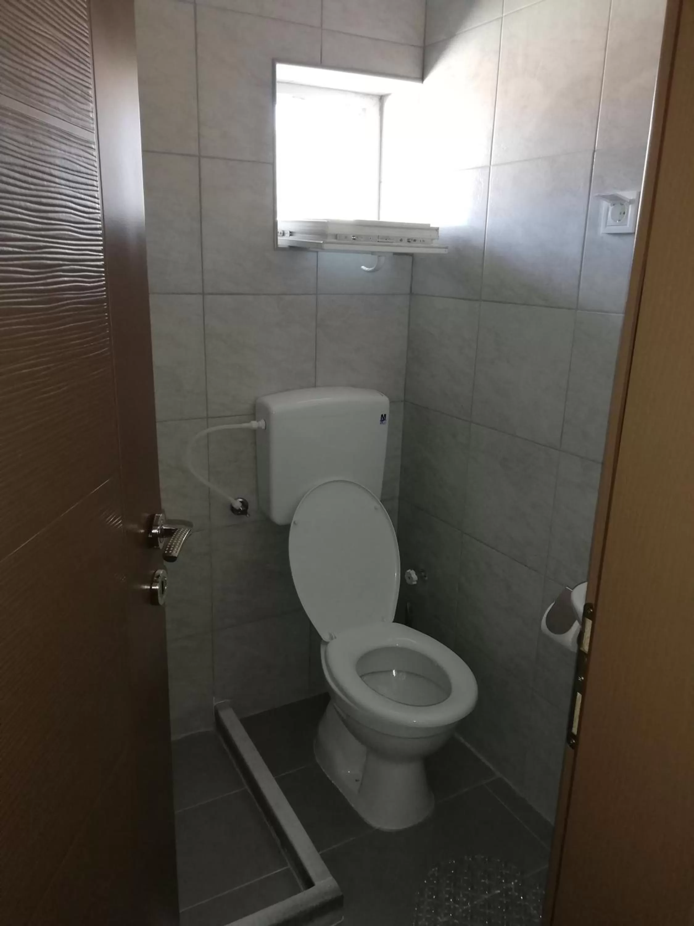 Bathroom in DIONIS Rooms & Apartments