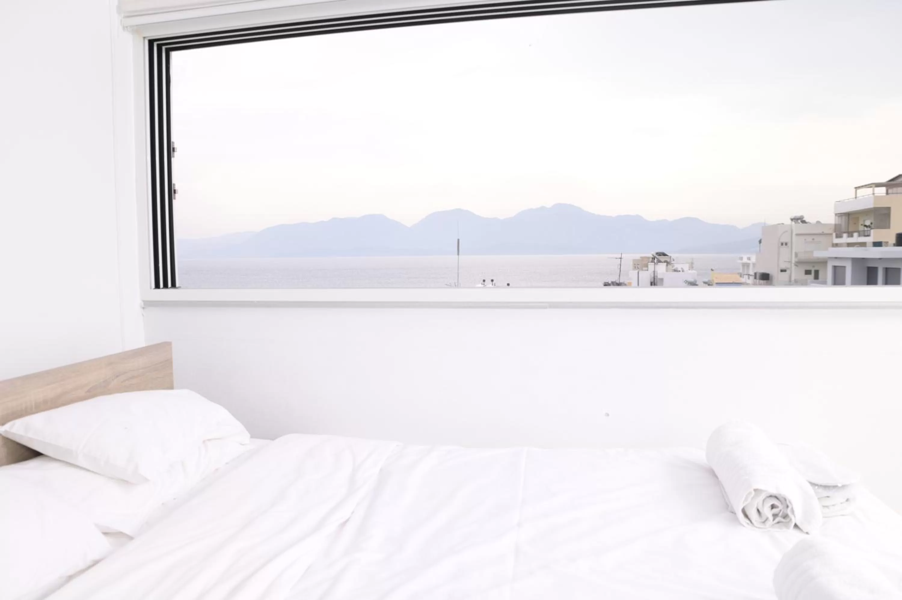 Bed in Ikaros Art Hotel