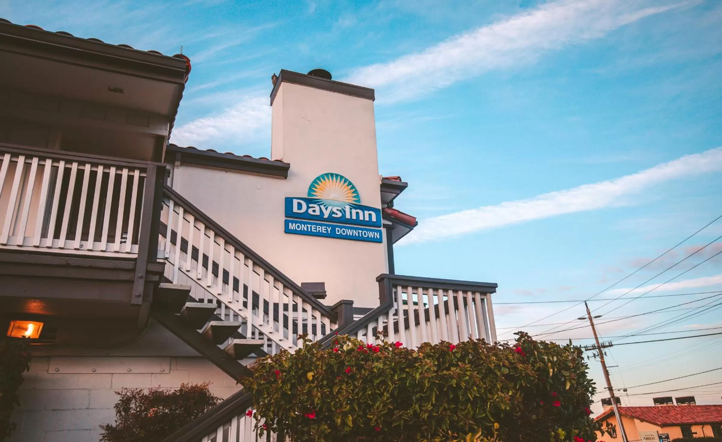 Property logo or sign in Days Inn by Wyndham Monterey Downtown