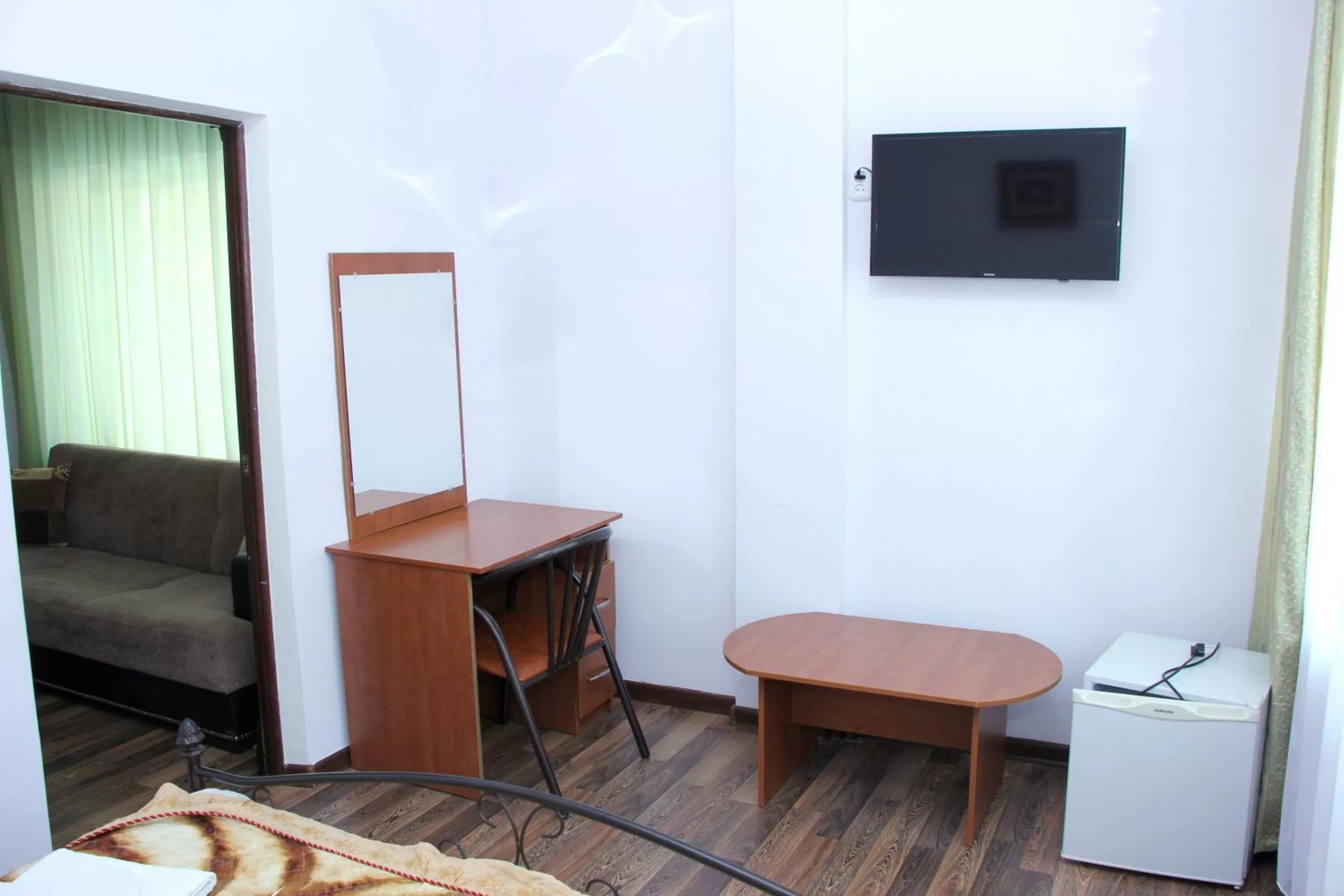 TV/Entertainment Center in Zhaylau Hotel