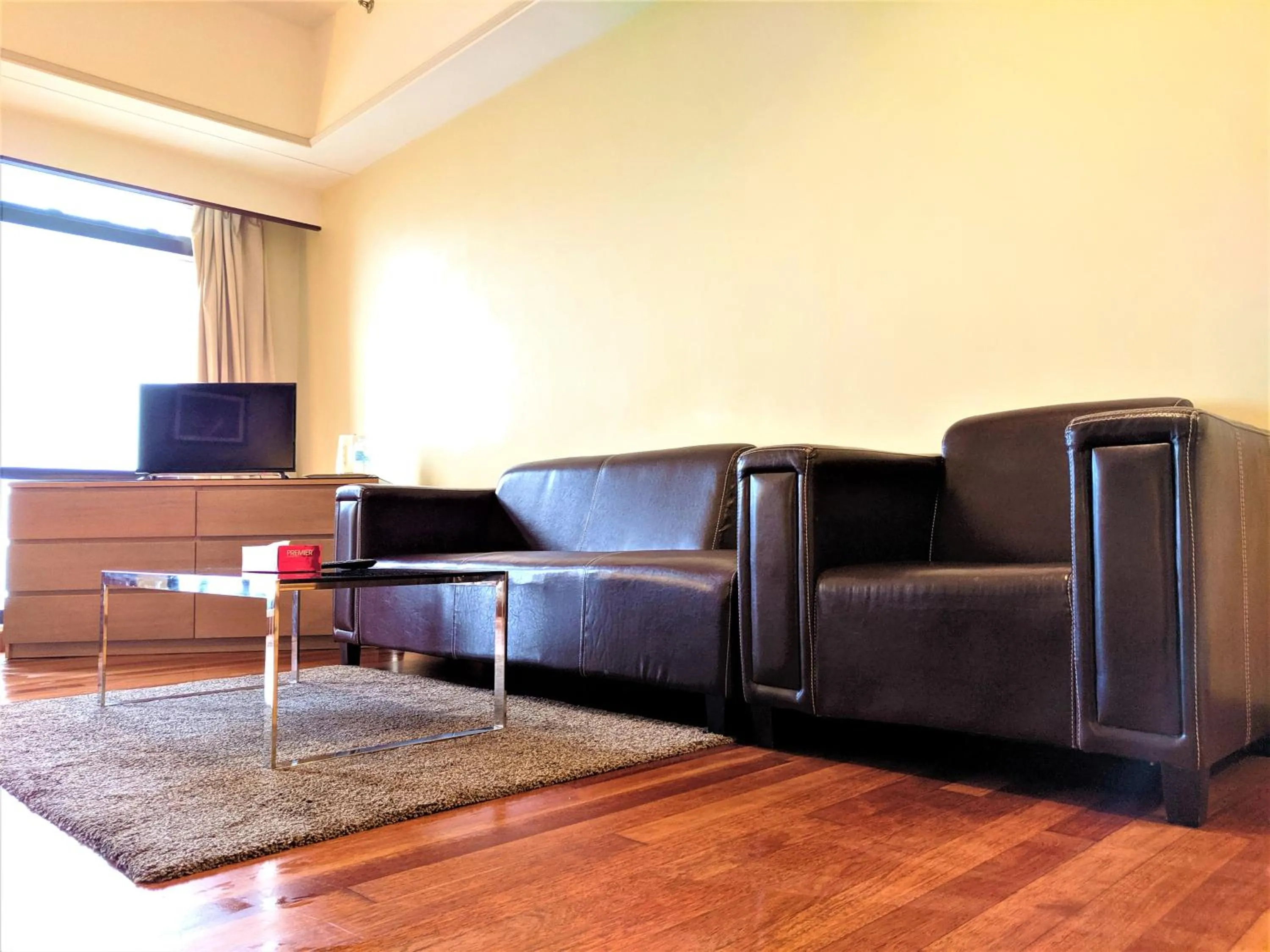 Living room in Serviced Apartments at Times Square Kuala Lumpur by Robinsons