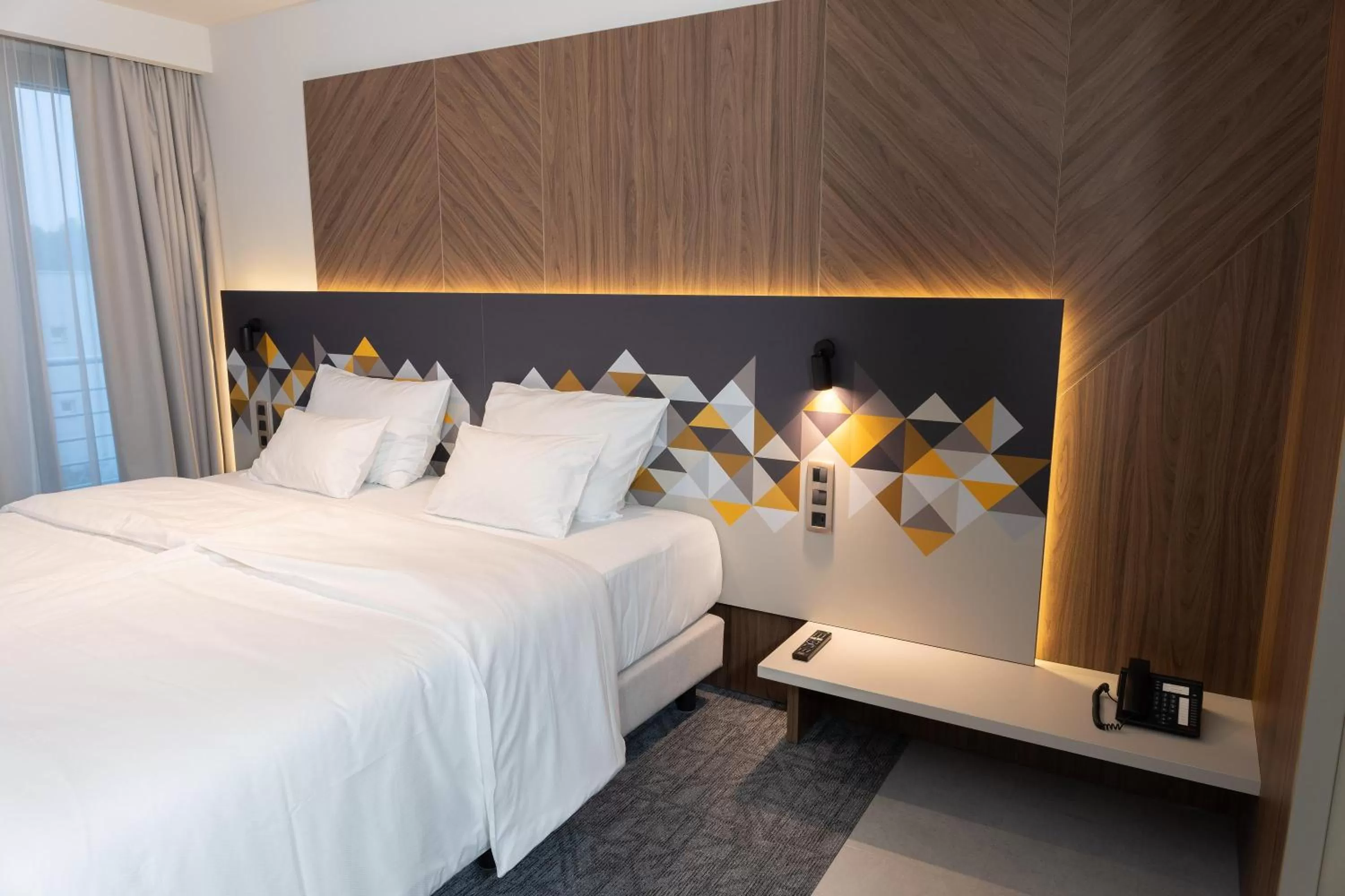 Photo of the whole room, Bed in Doubletree by Hilton Ljubljana