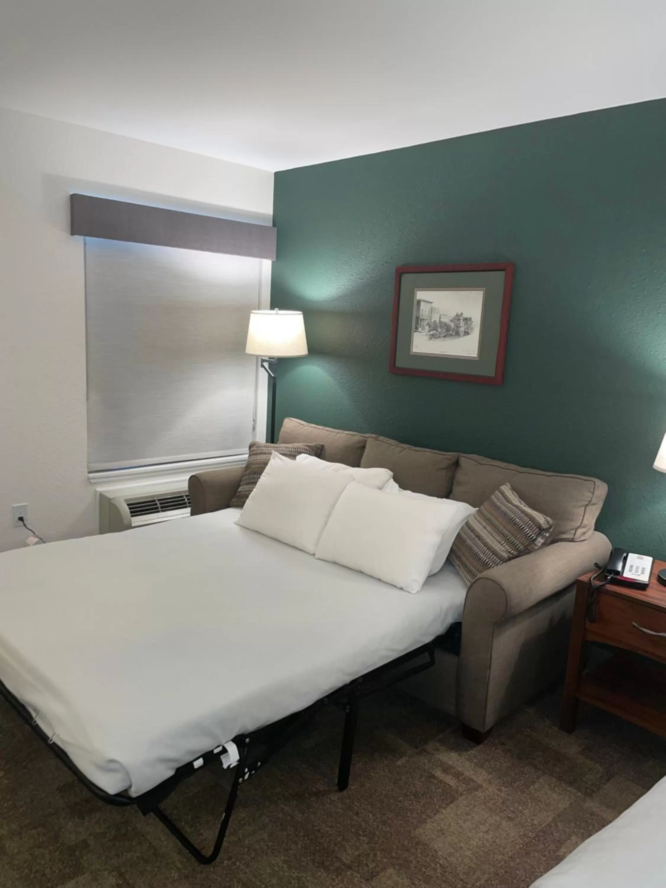 Photo of the whole room, Bed in Boothill Inn and Suites