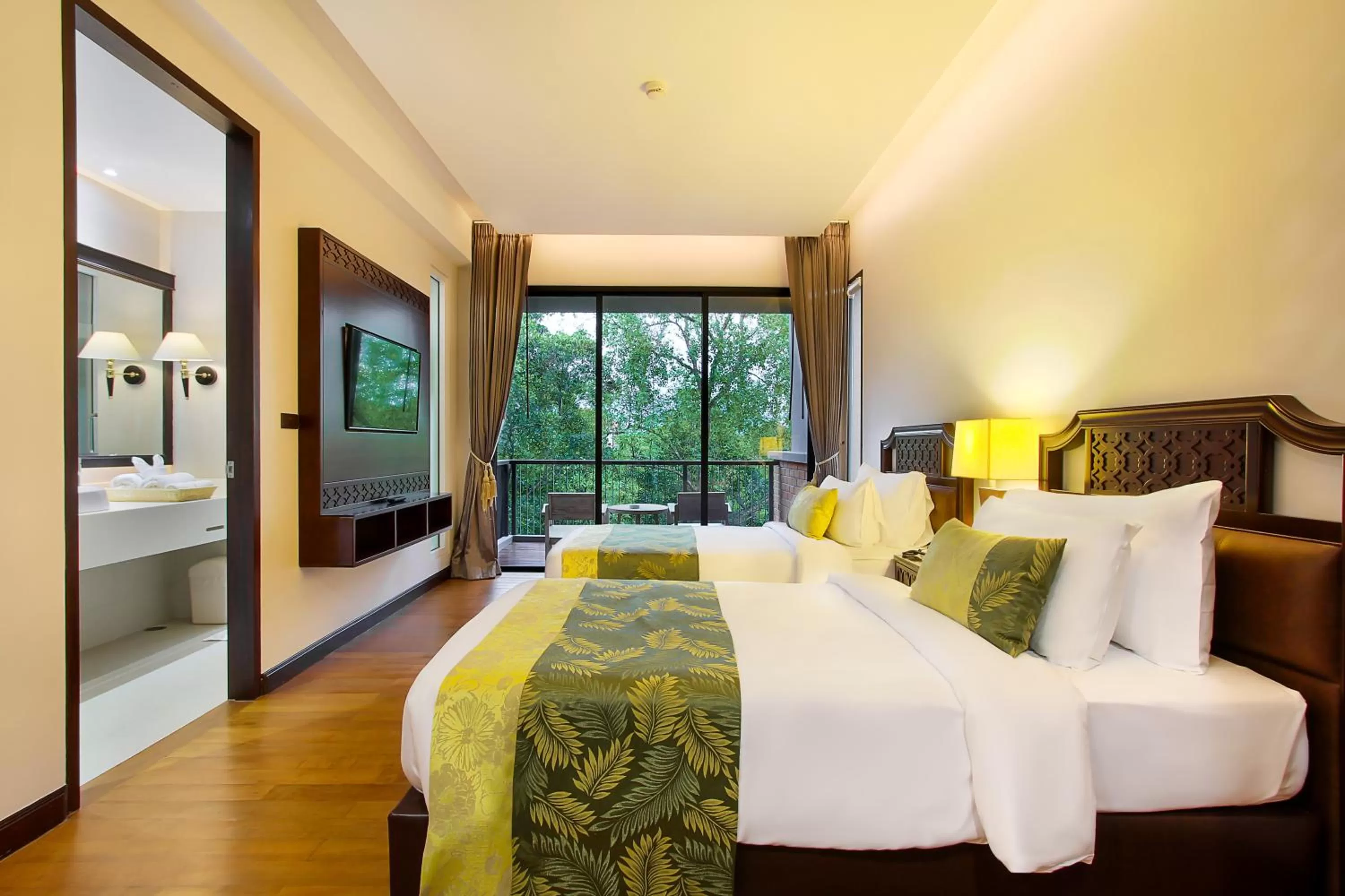 Photo of the whole room, Bed in Rimnaam Klangchan Hotel - SHA Plus