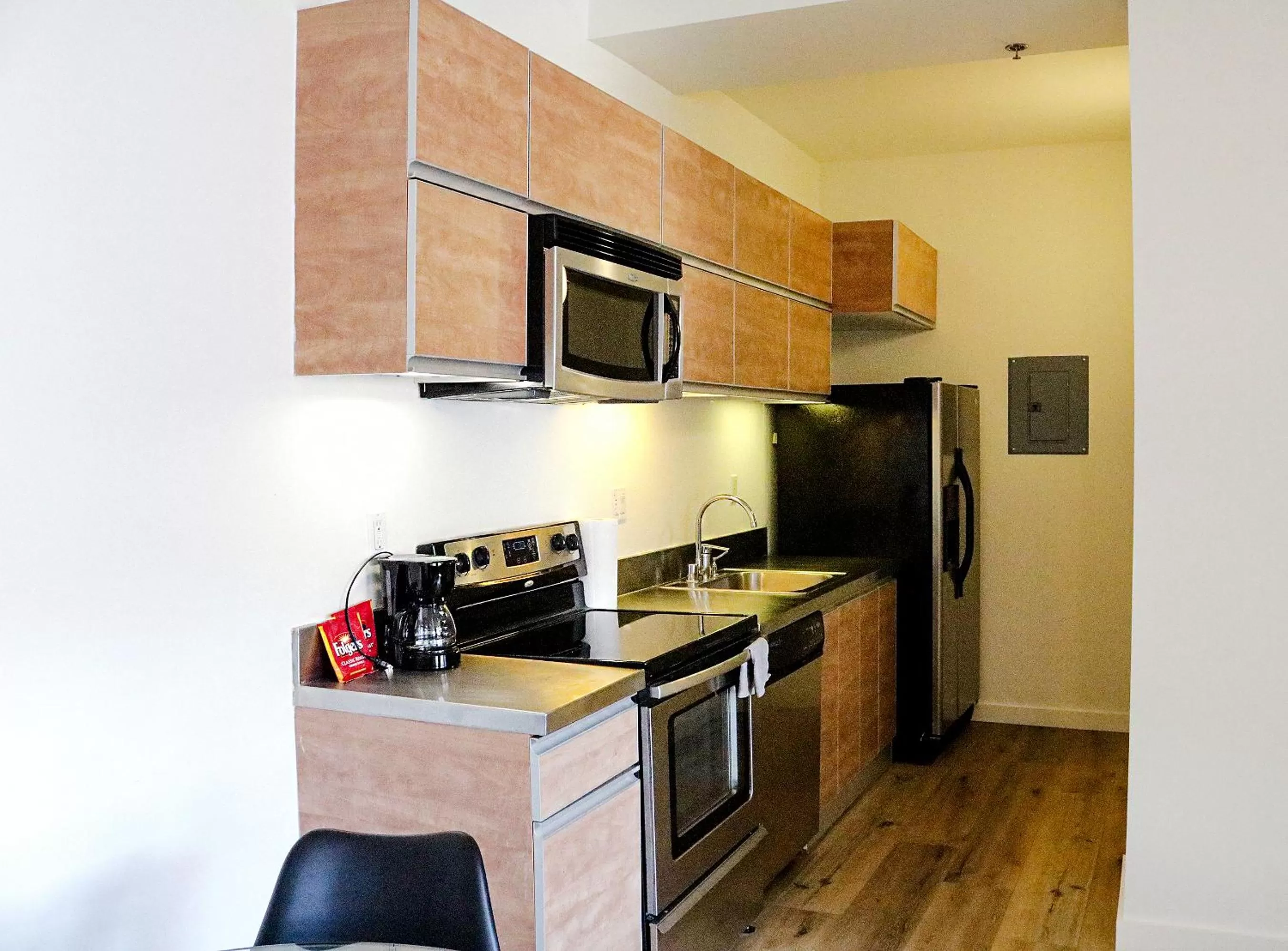Kitchen/Kitchenette in The Haas Suites