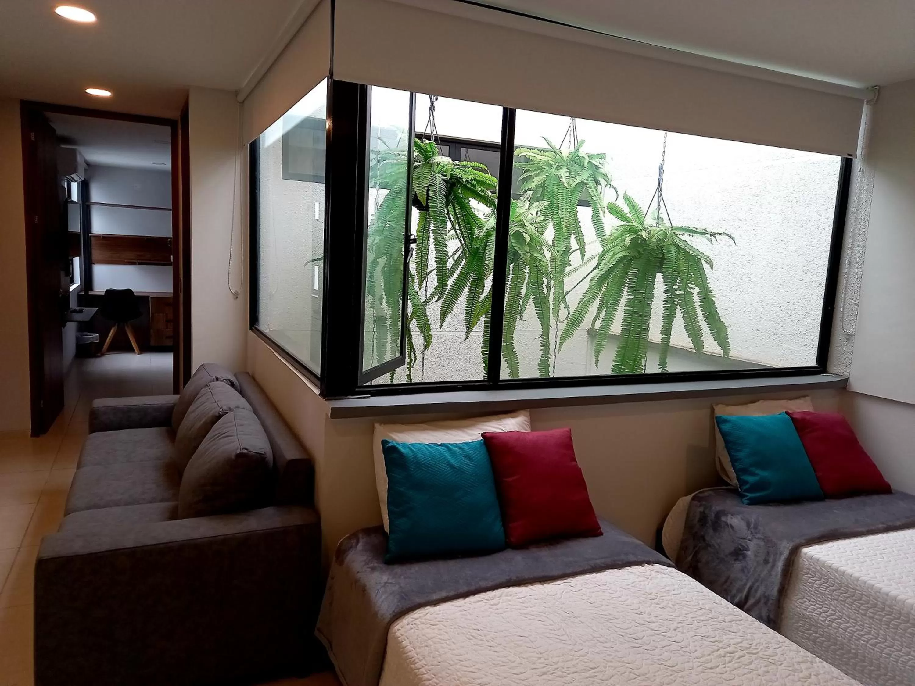 Bedroom, Seating Area in Kapital Suites