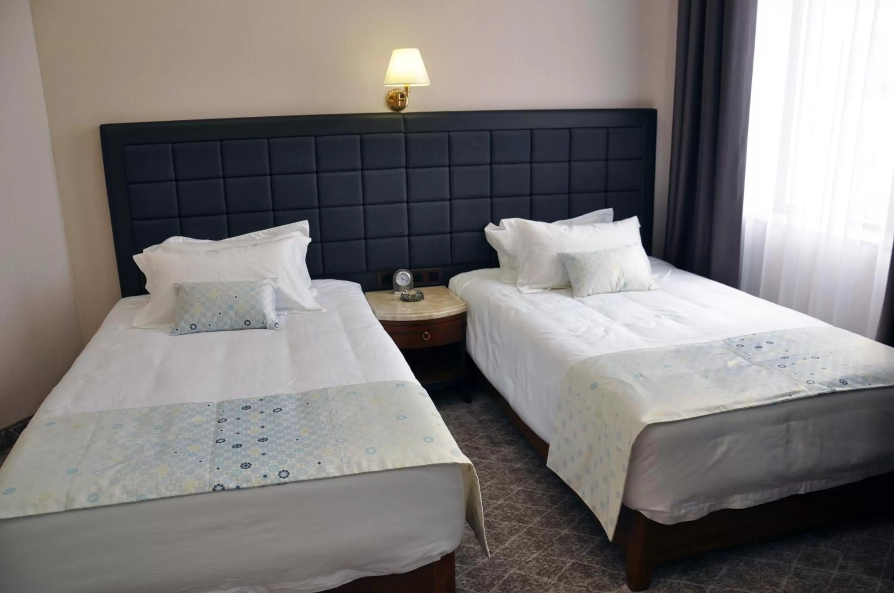 Bed in Parliament Palace Hotel