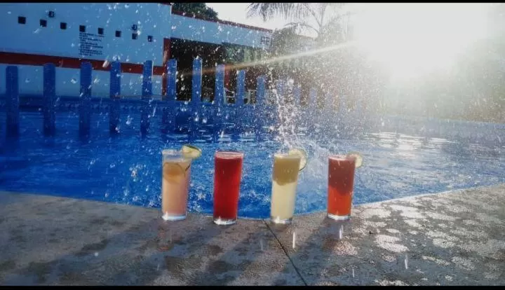 Drinks, Swimming Pool in Hotel & Restaurant D´Concepción