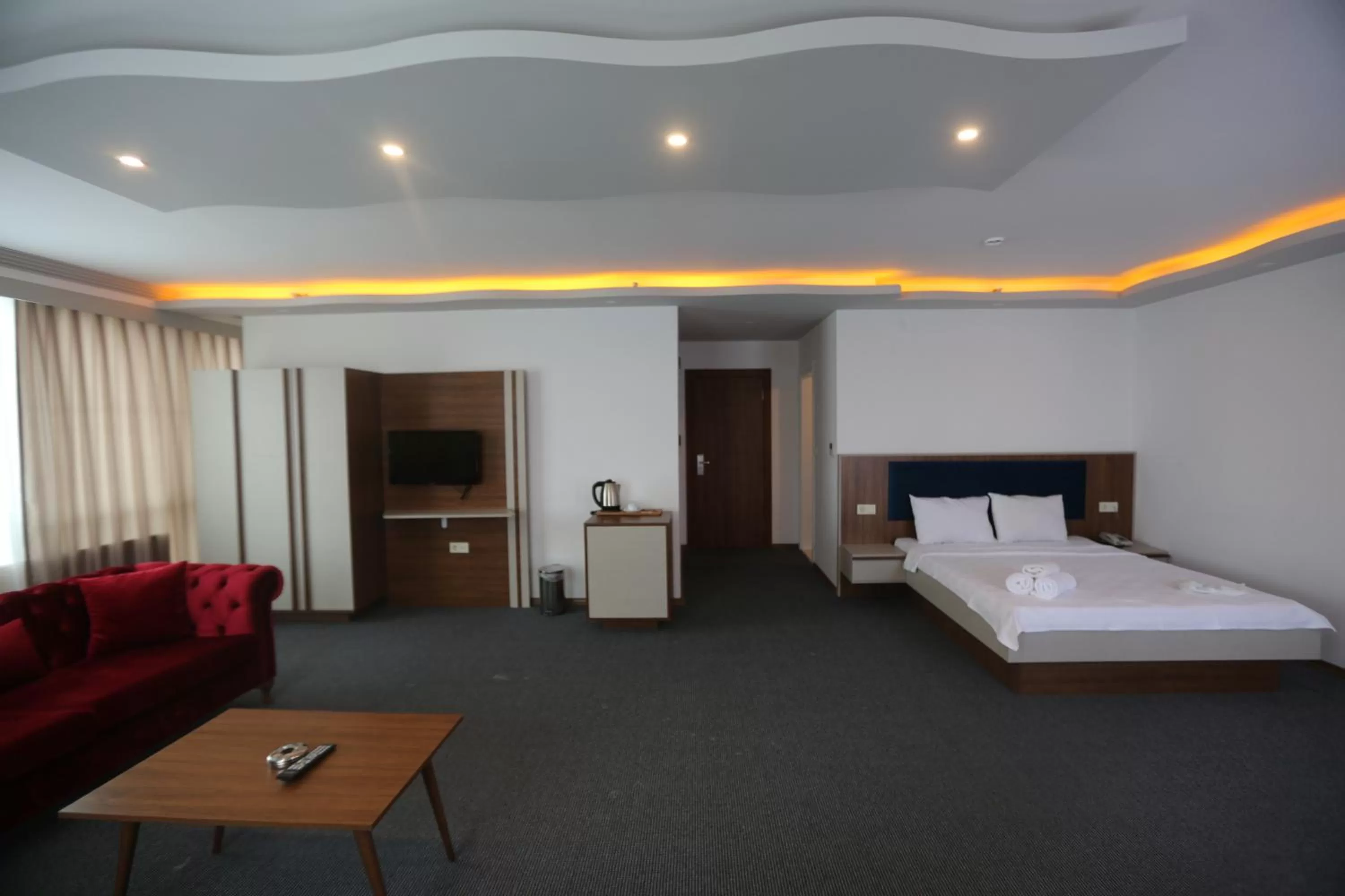 Bed in TEVETOGLU HOTEL