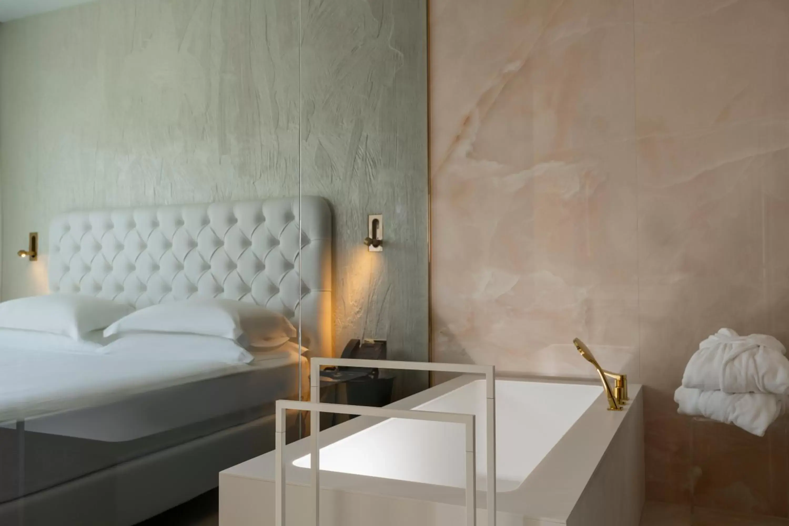 Junior Suite with balcony and side sea view in The Promenade Luxury Wellness Hotel Junior Suite with balcony and side sea view in The Promenade Luxury Wellness Hotel