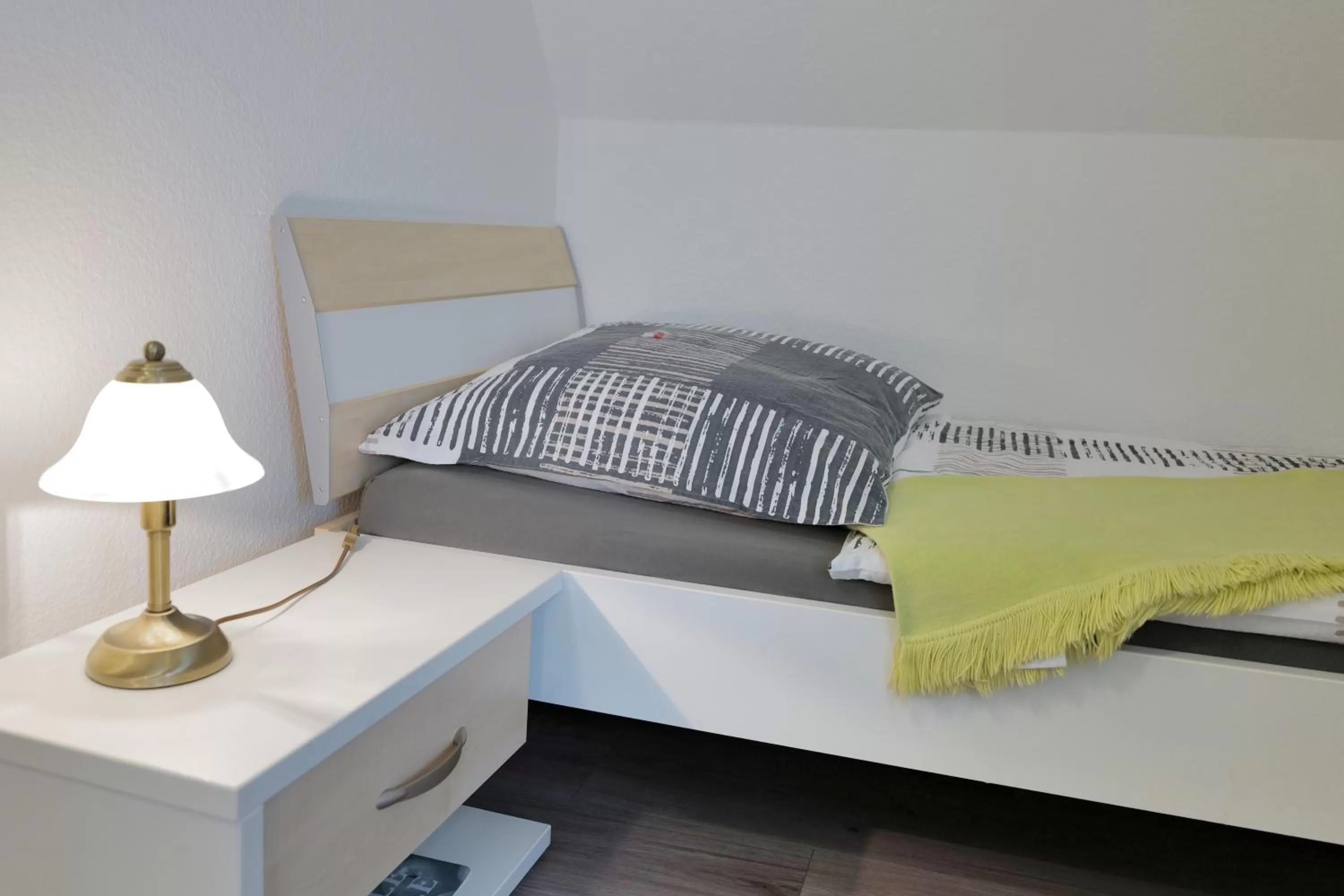 Bed in Elena Kempf Haaratelier & Guesthouse