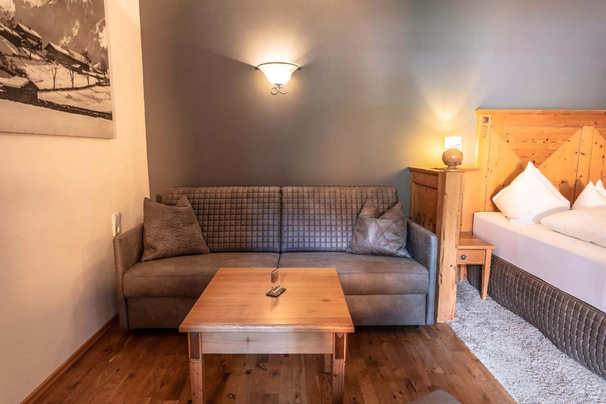 Seating area, Bed in Hotel Kaprunerhof