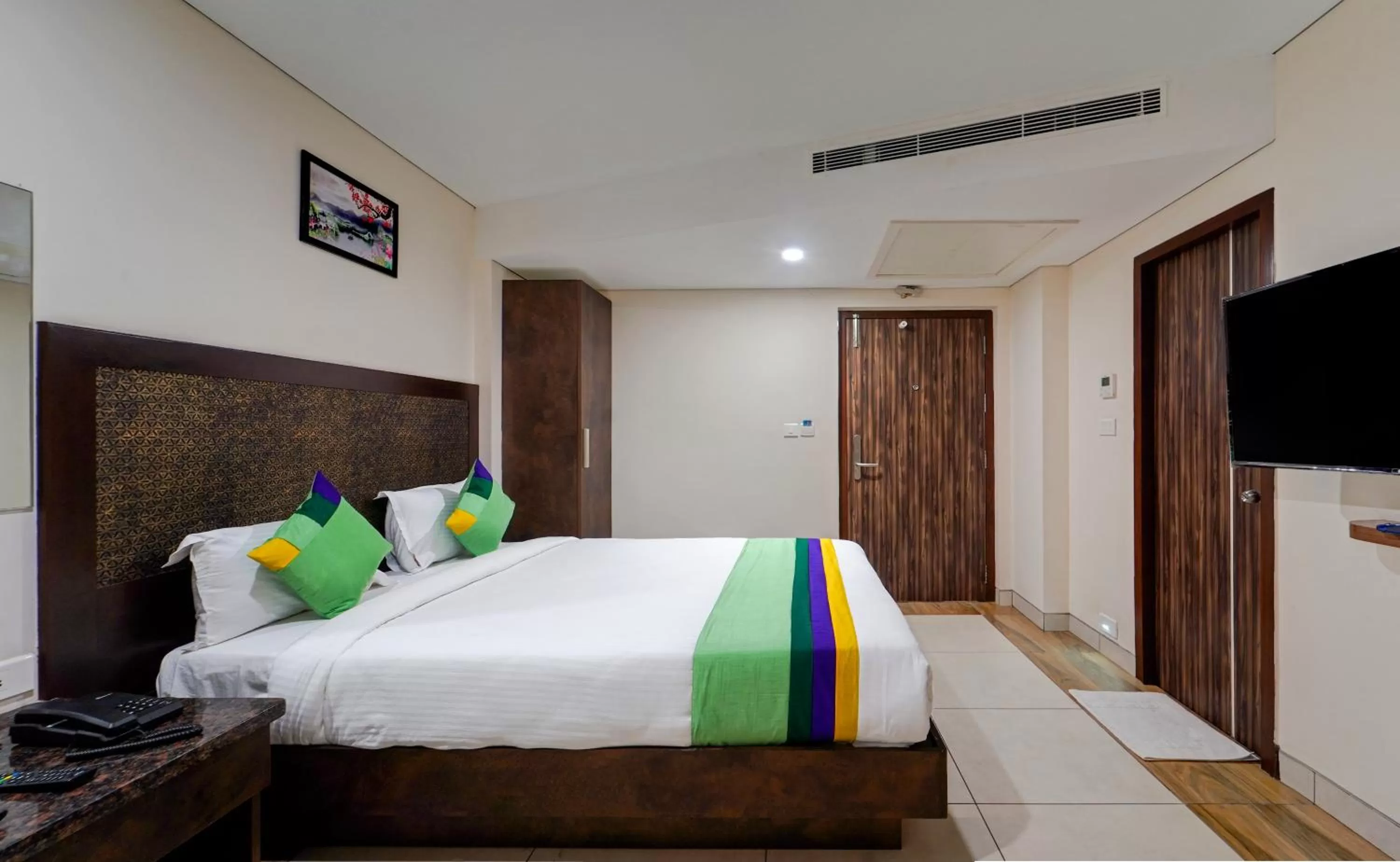 Bed in Treebo Vetri Supreme Residency