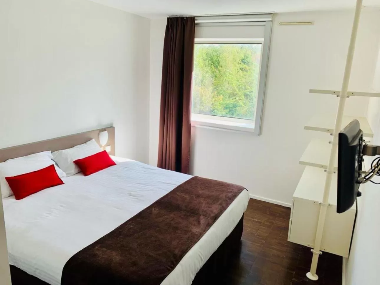 Bed in Standing Hotel Suites by Actisource