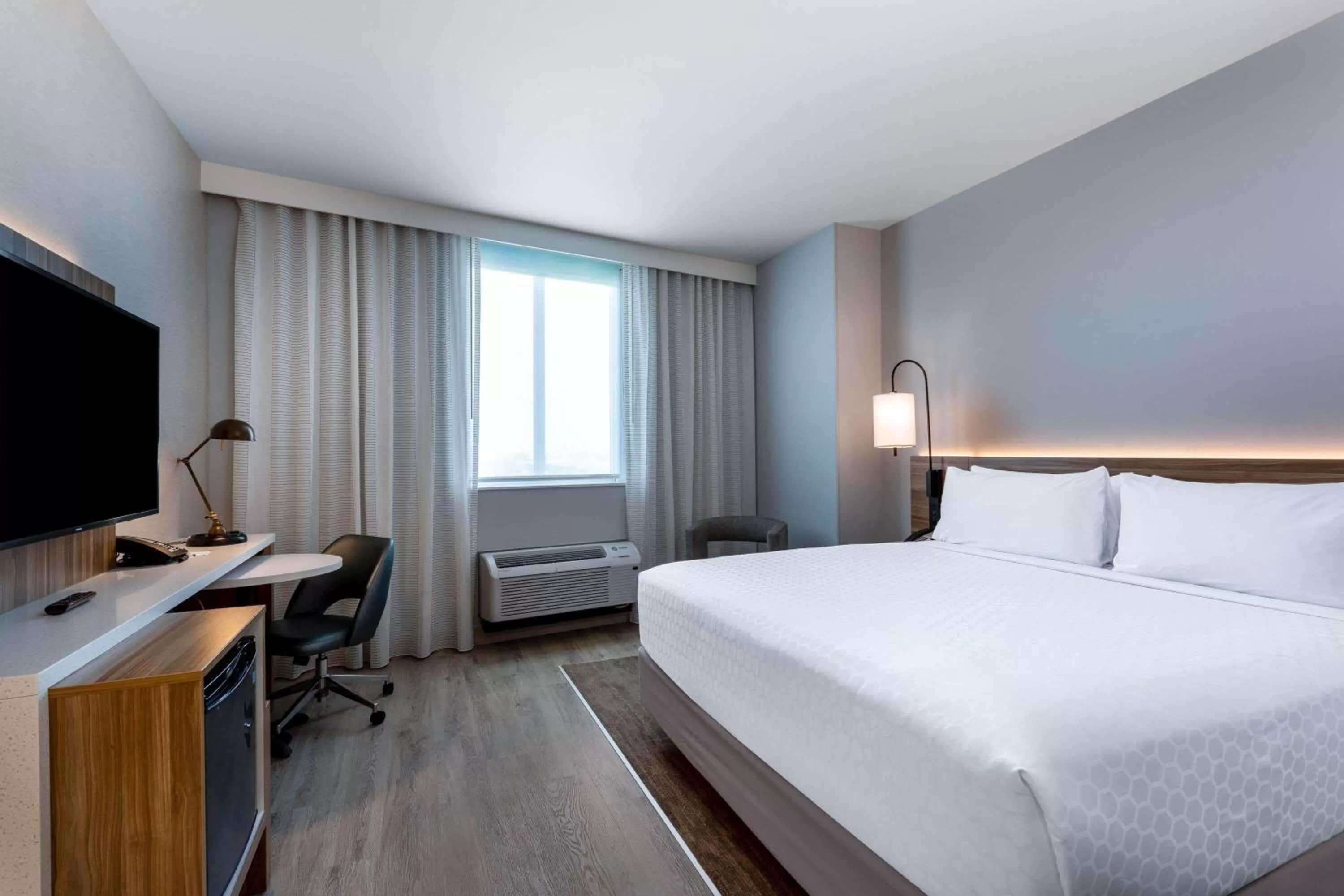 Photo of the whole room, Bed in Wyndham Garden Miami International Airport