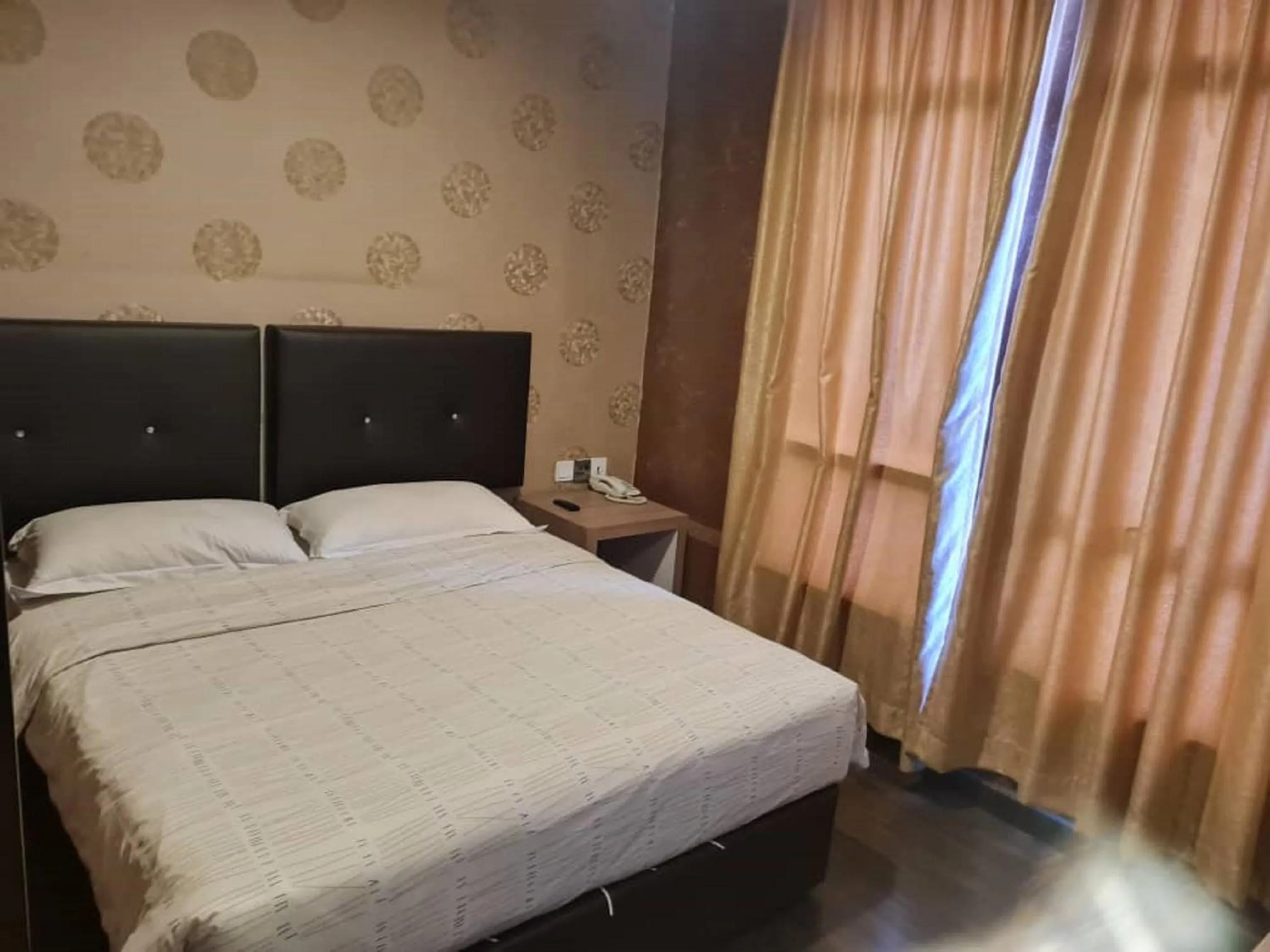 Bed in Hotel Nusa CT