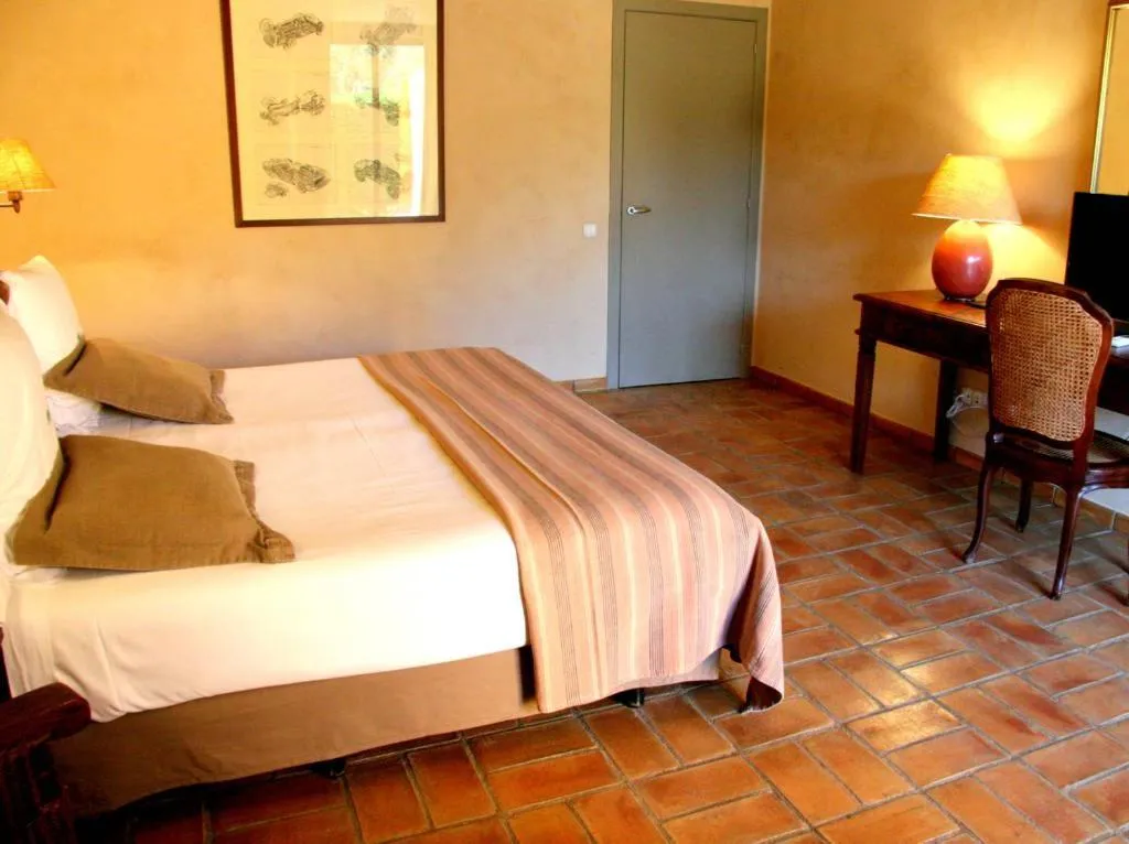 Bed in Mas Salvi Country Boutique Hotel