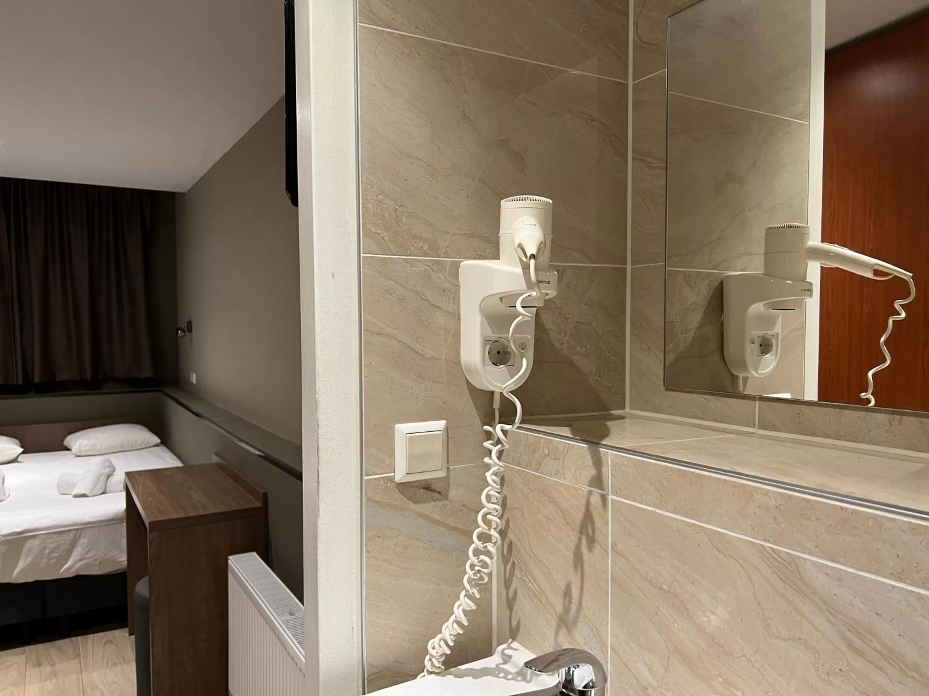 Bathroom in Blossoms City Hotel