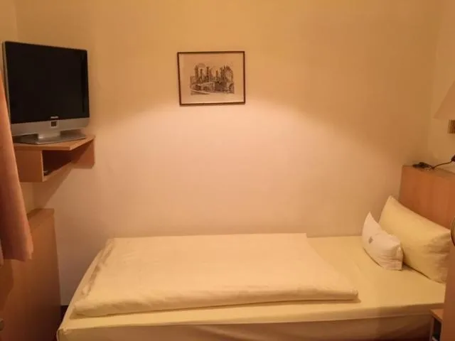Bed in Hotel Benn