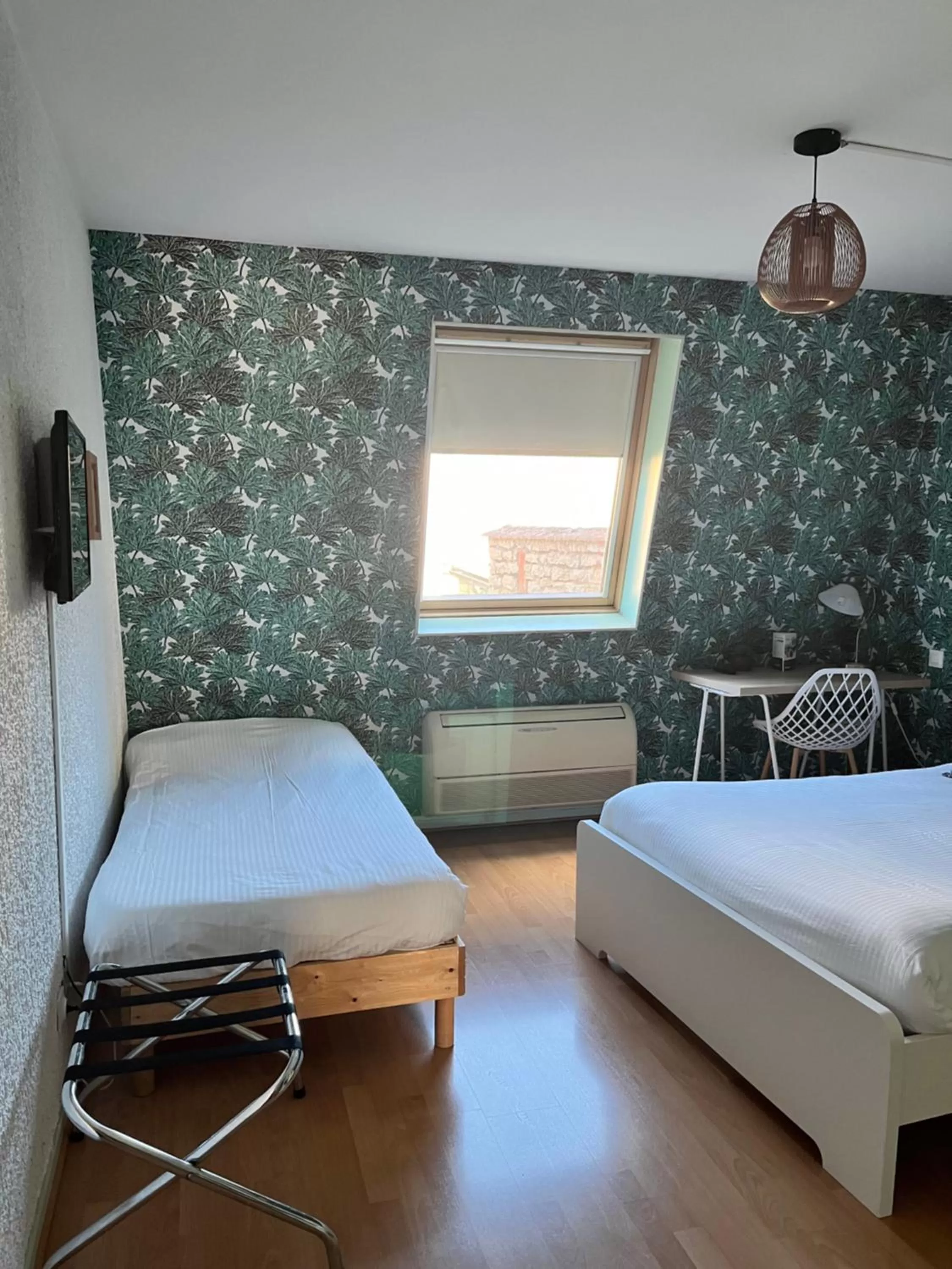 Photo of the whole room, Bed in Hôtel Le Thurot- Dijon Centre ville Gare