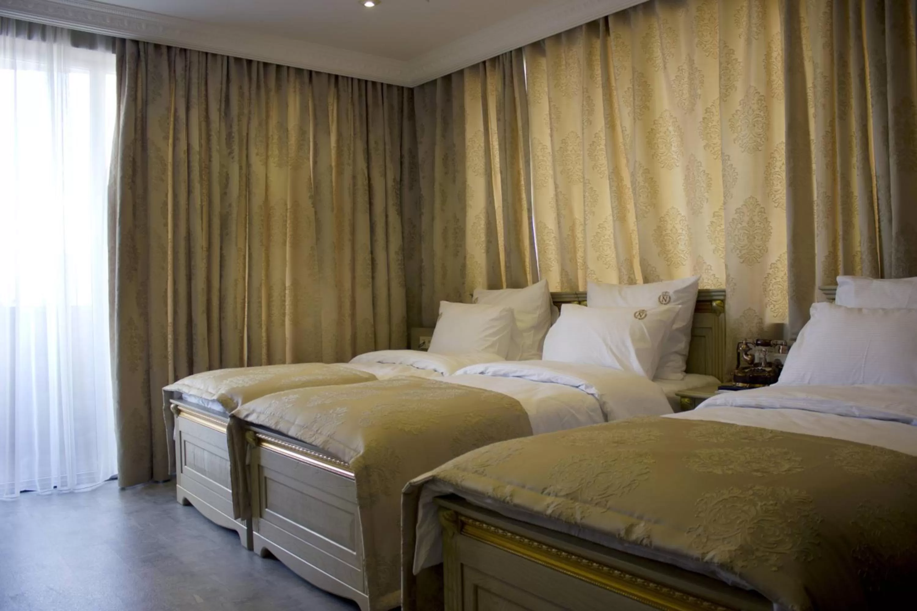 Bed in Neapol Boutique Hotel