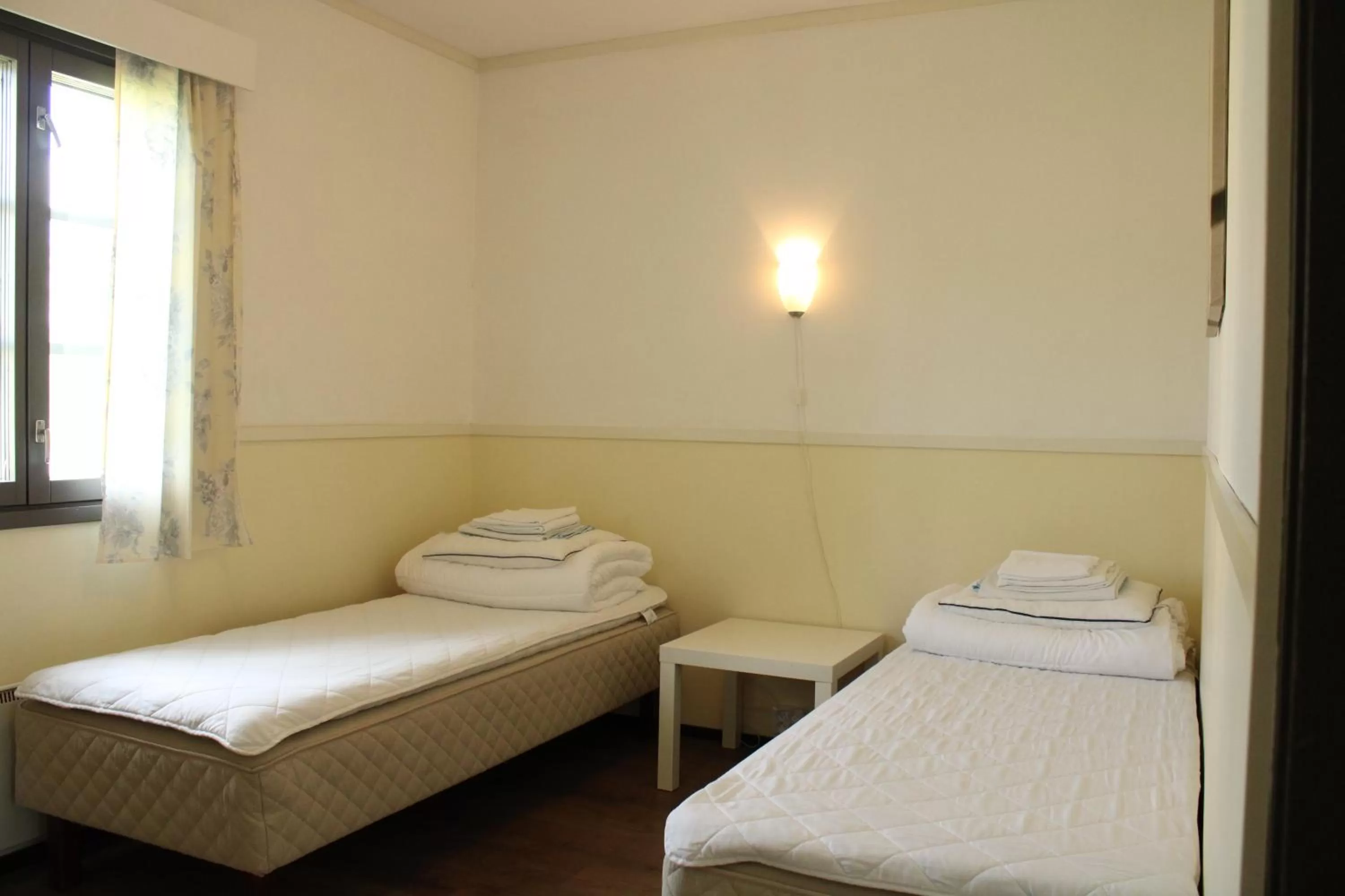 Bed in Visulahti Cottages