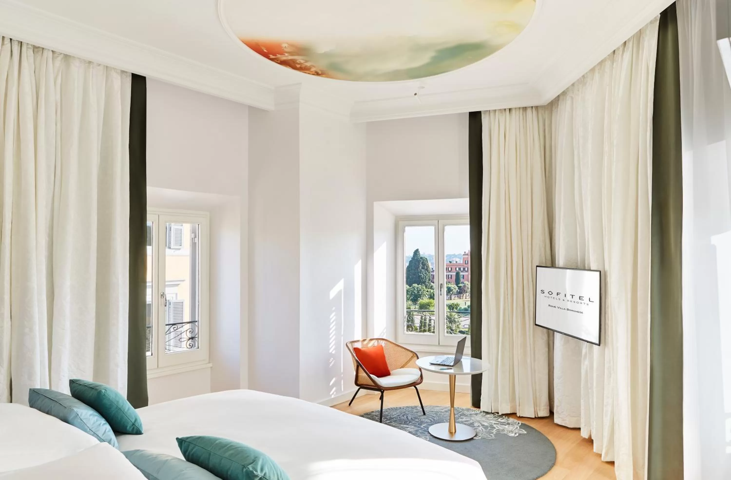 Living room, Bed in Sofitel Roma Villa Borghese