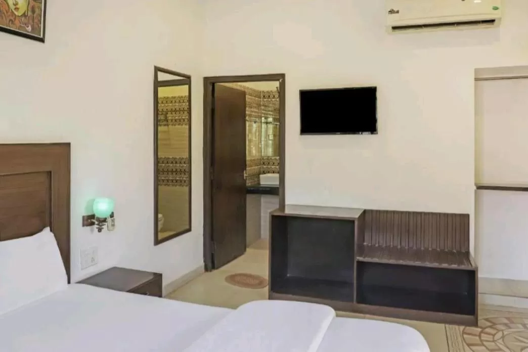 Bed in Hotel Ramayana Khajuraho