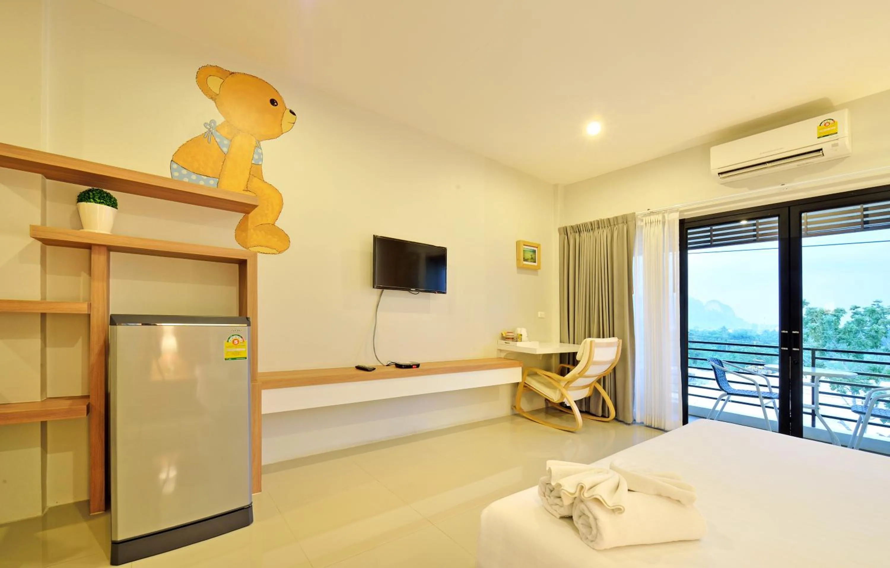 Photo of the whole room, Bed in Tairada Boutique Hotel