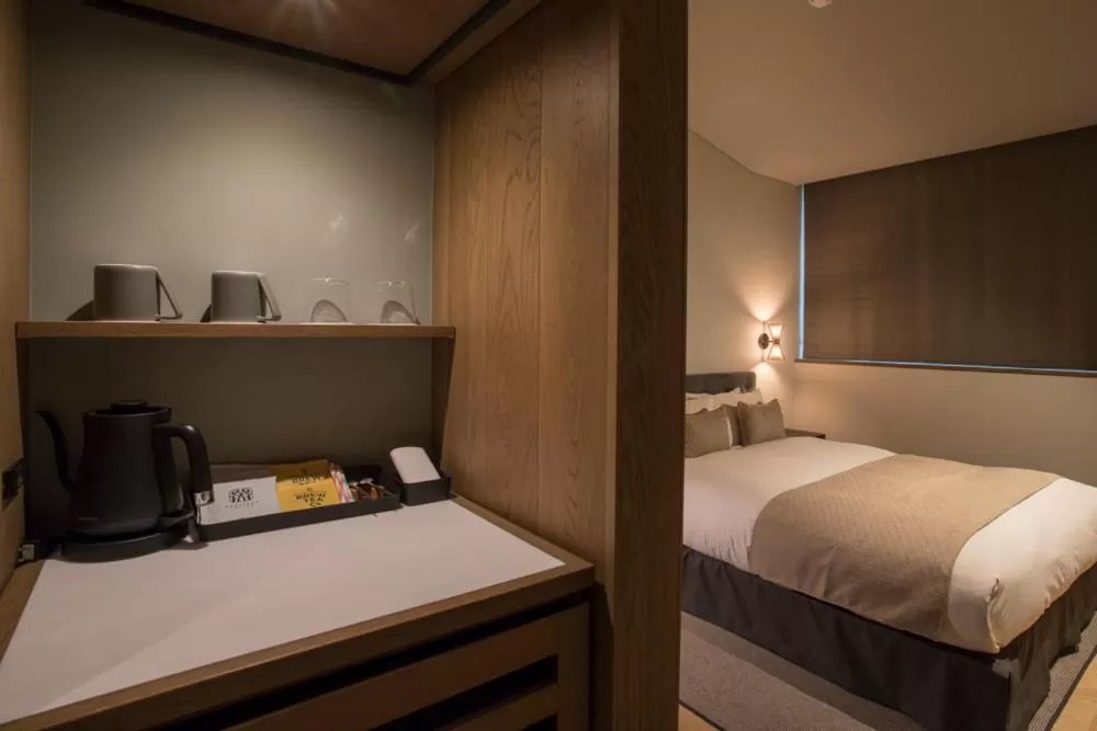 Bed in HOTEL CANATA KYOTO